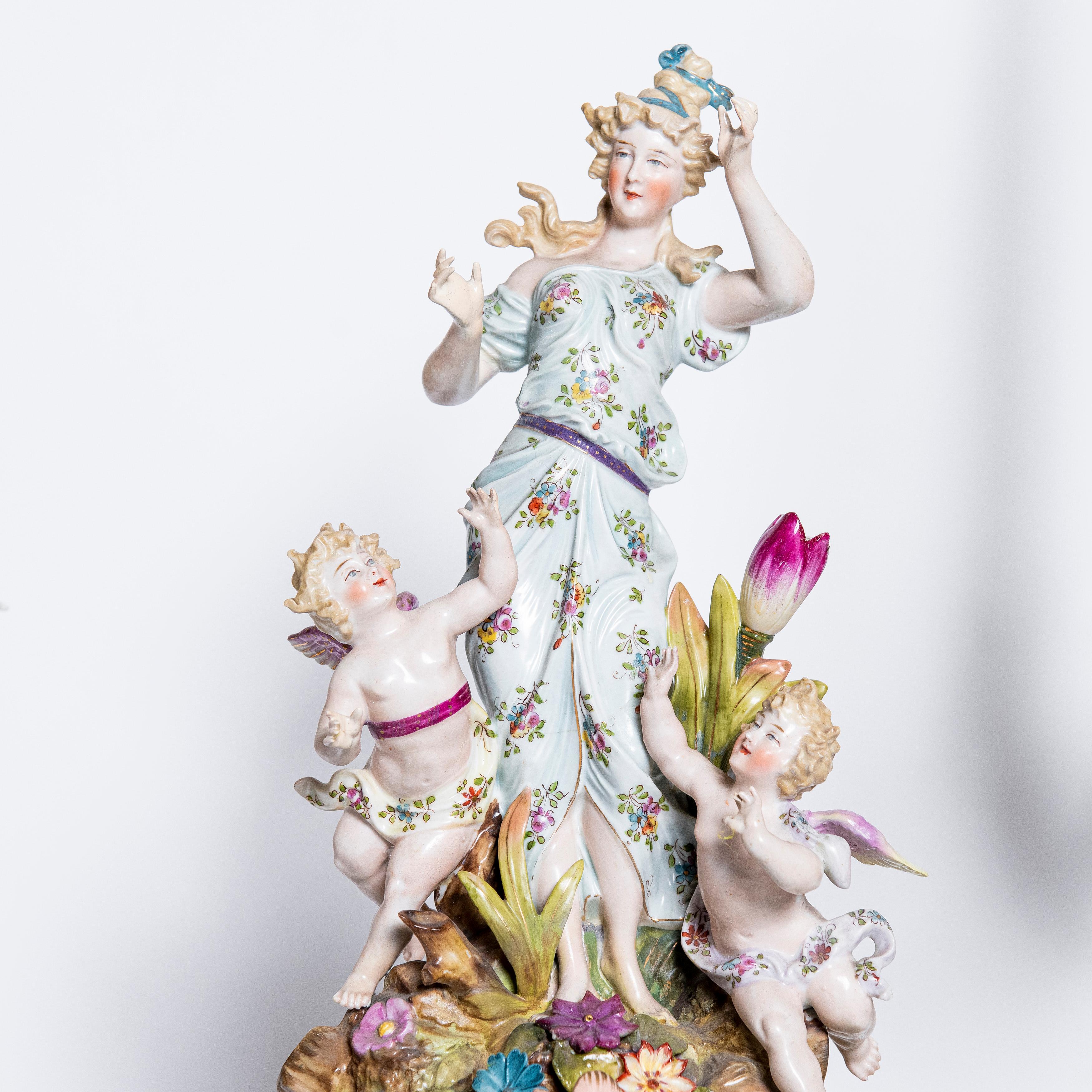 20th Century Porcelain Garniture with Flowers and Angels. Germany, circa 1900 For Sale