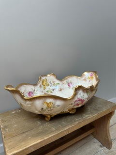 Porcelain gilded footed large floral bowl, by W.A.A. & Co, 1890, Centrepiece