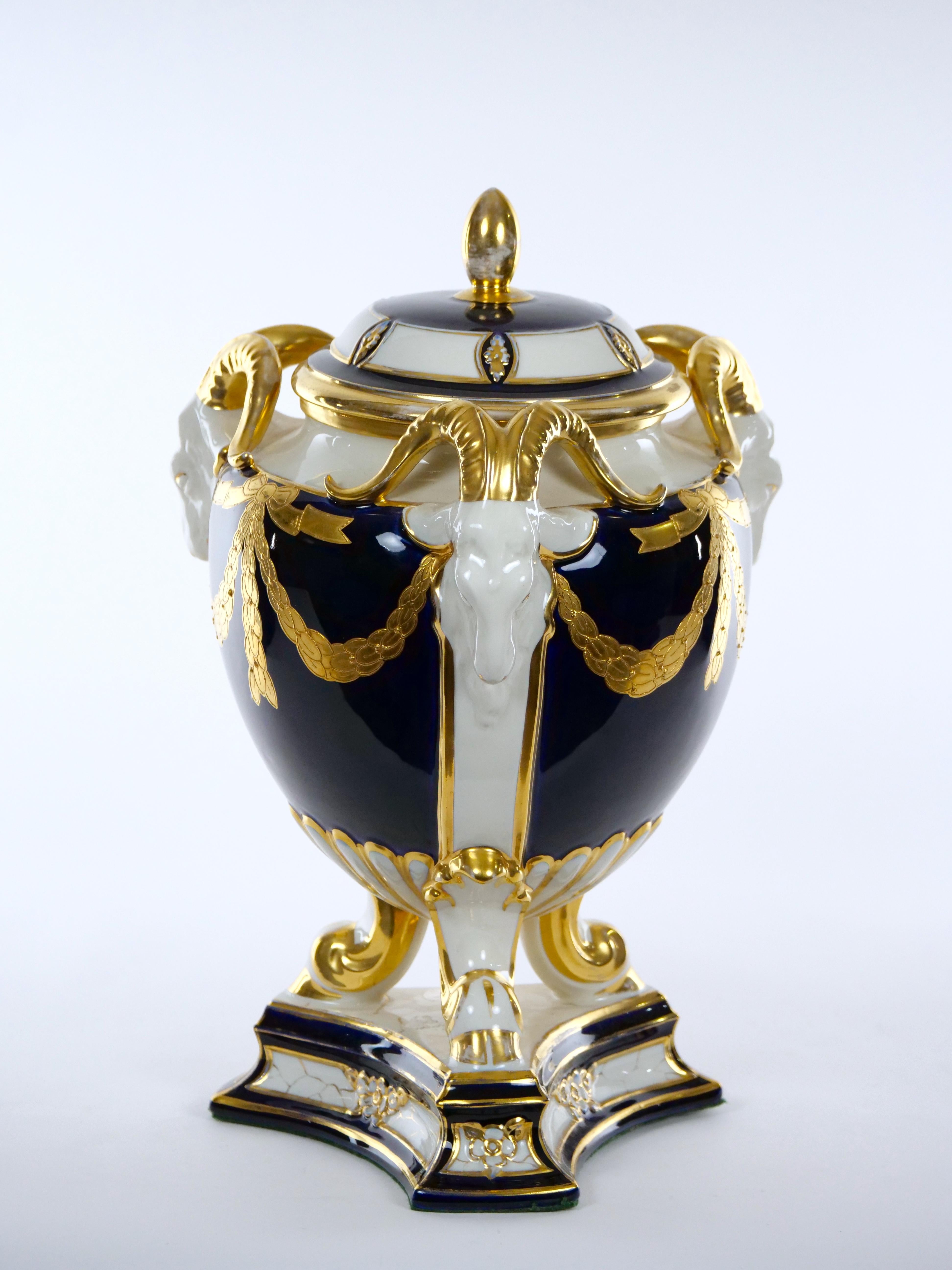 Porcelain/ Gilt Gold Covered Urn / Figural Ram’s Head Handles In Good Condition In Tarry Town, NY