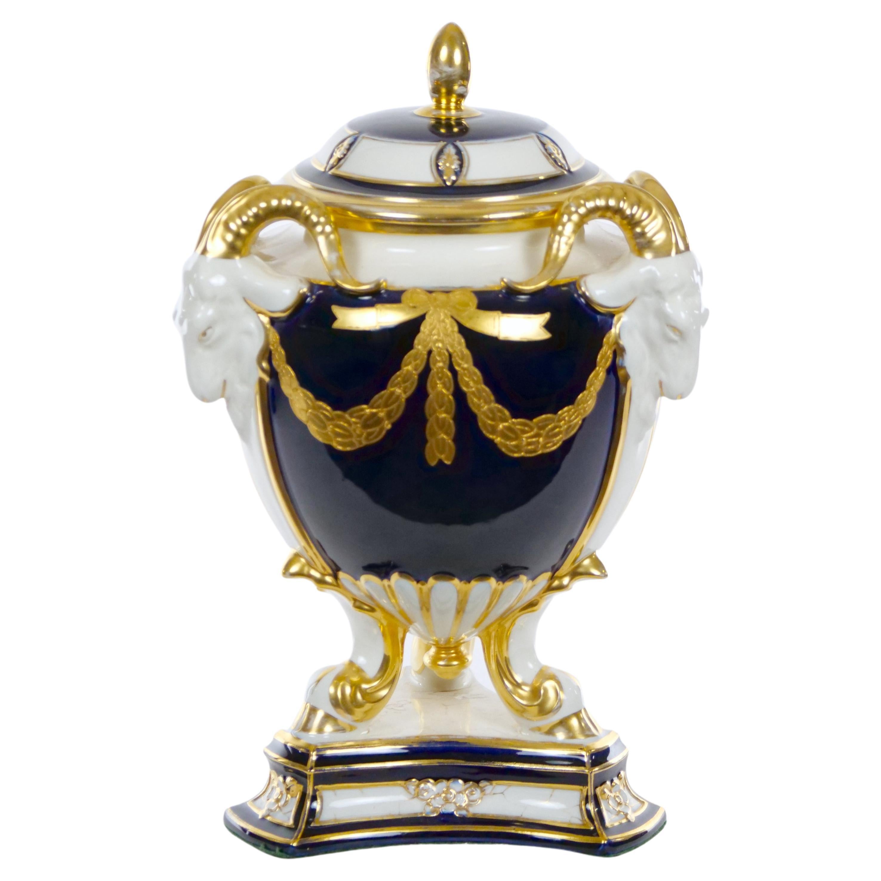 Porcelain/ Gilt Gold Covered Urn / Figural Ram’s Head Handles
