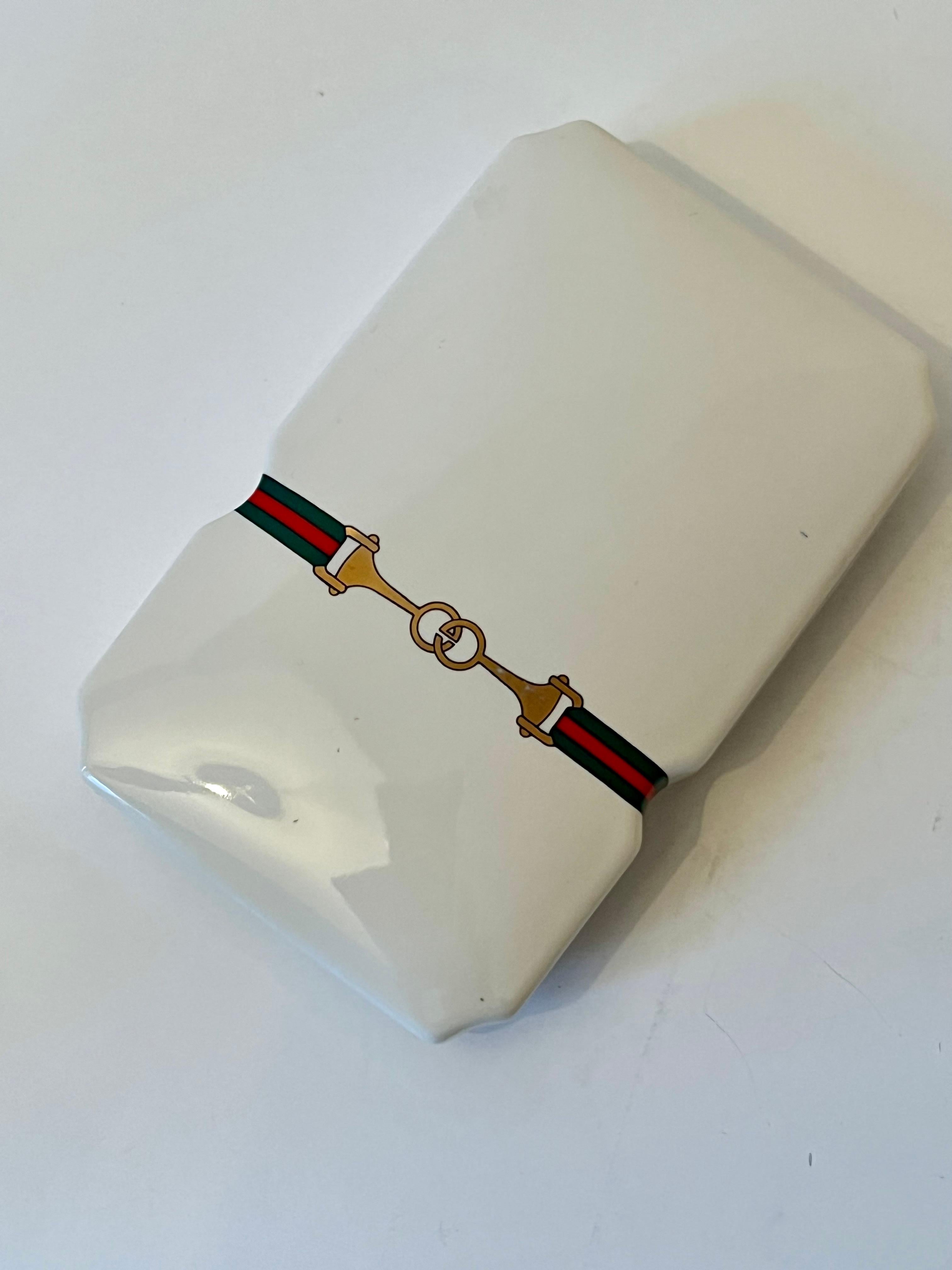 A wonderful porcelain box with the Gucci logo. Originally sold as a set for Incense, the holder is also included with some incense. We would suggest using this for a desk accessory, or for 420 incense!

Sophisticated and elegant, a compliment to