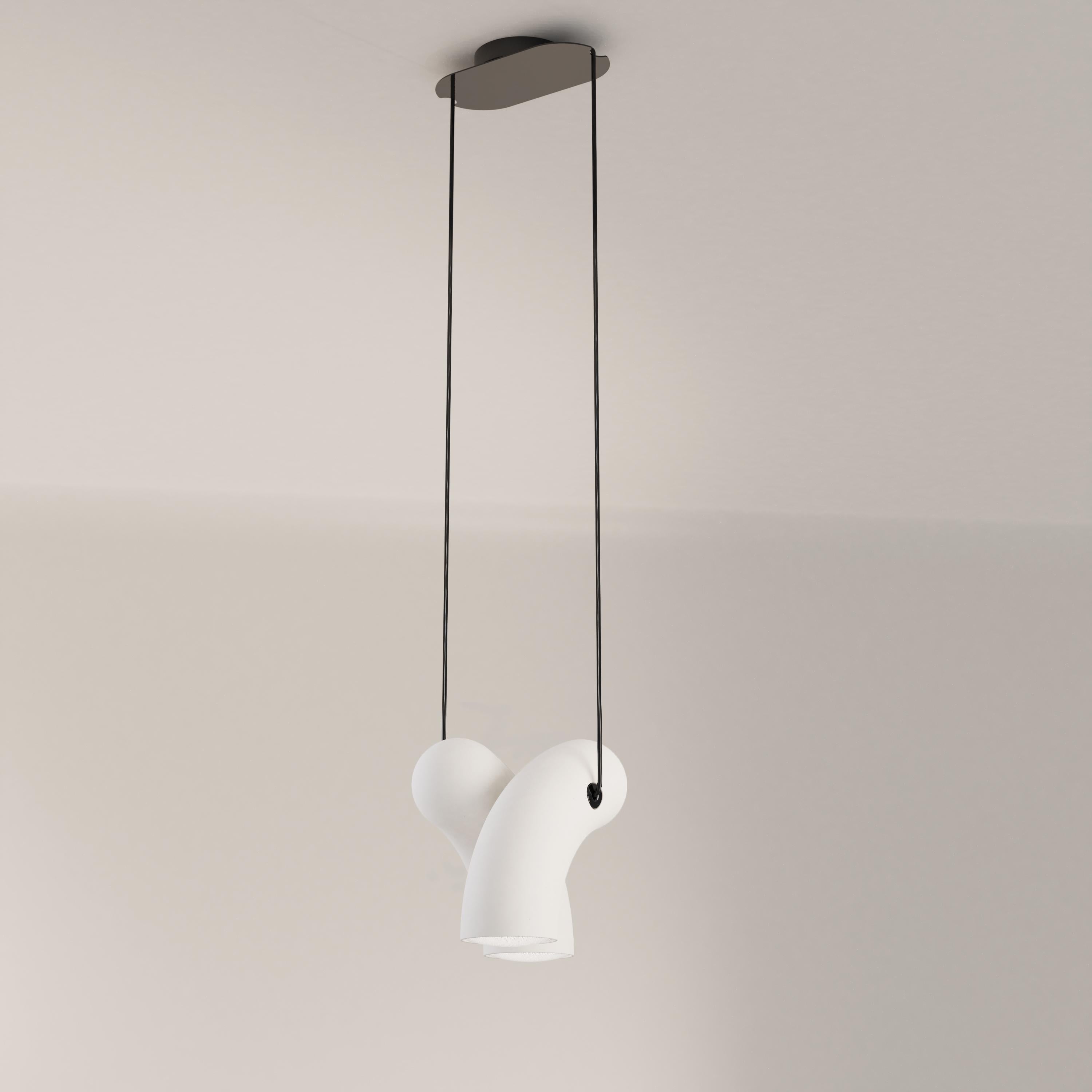 Porcelain Hyphen pendant lamp by Studio d'Armes
Dimensions: D 29 x W 22 x H 24 cm
Materials: Matte white porcelain.
Available in steel sandy black, steel chromatic black, natural porcelain and steel custom.

Derived from the ancient Greek ?f’