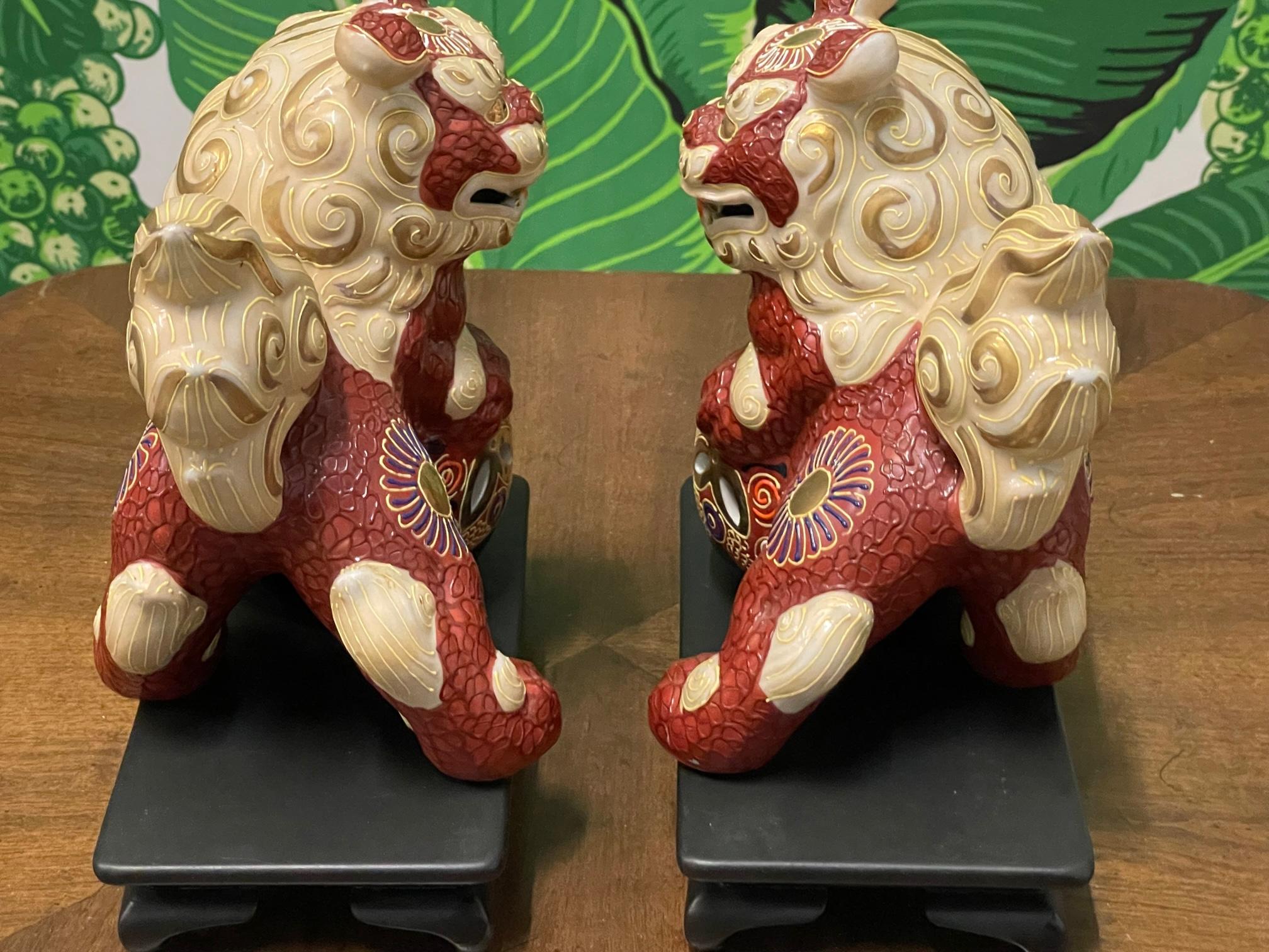 20th Century Porcelain Japanese Cinnabar Foo Dog Figurines on Stands For Sale