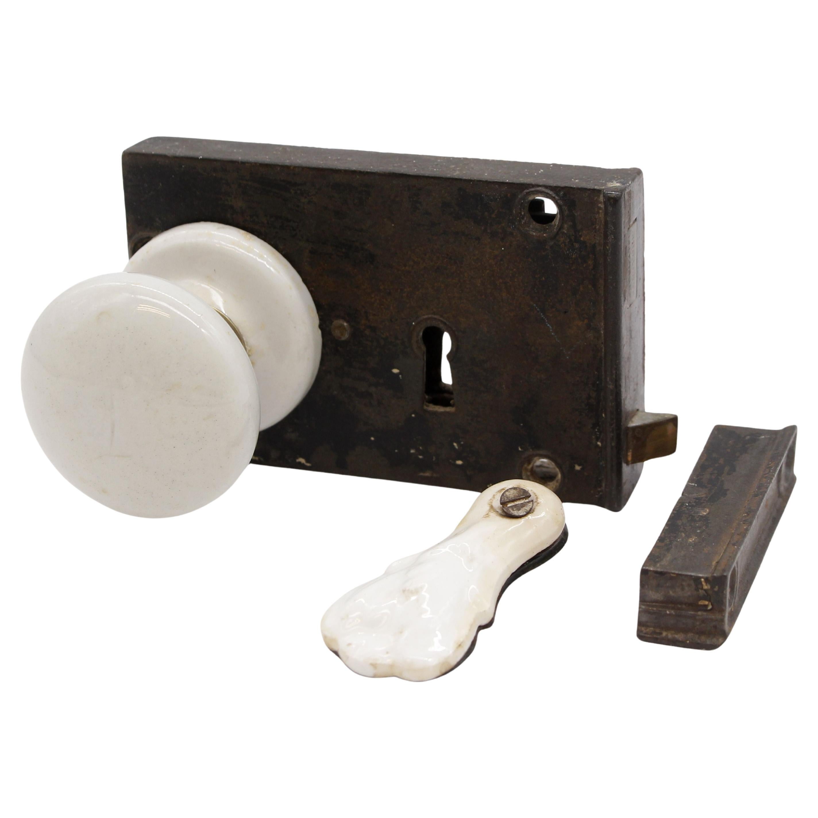 Pomo de porcelana giratorio a la derecha Juego de cerraduras de hierro fundido para puertas Cantidad disponible