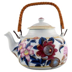 Porcelaine de Paris, "Tropical Aurore", Théière en porcelaine avec poignée en osier