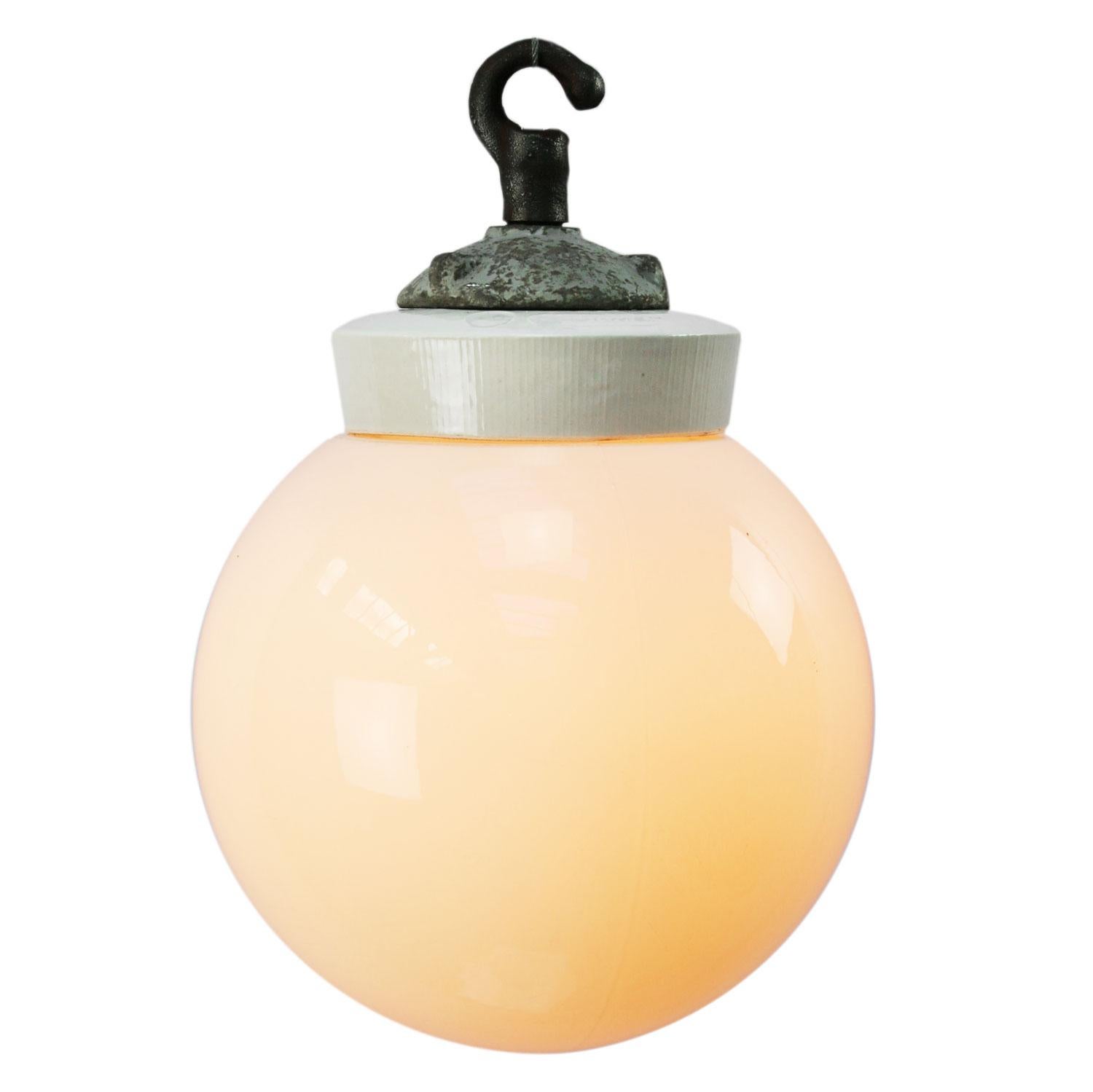 Porcelain Industrial hanging lamp.
White porcelain, cast iron and white opaline glass.
2 conductors, no ground.

Weight: 2.00 kg / 4.4 lb

Priced per individual item. All lamps have been made suitable by international standards for