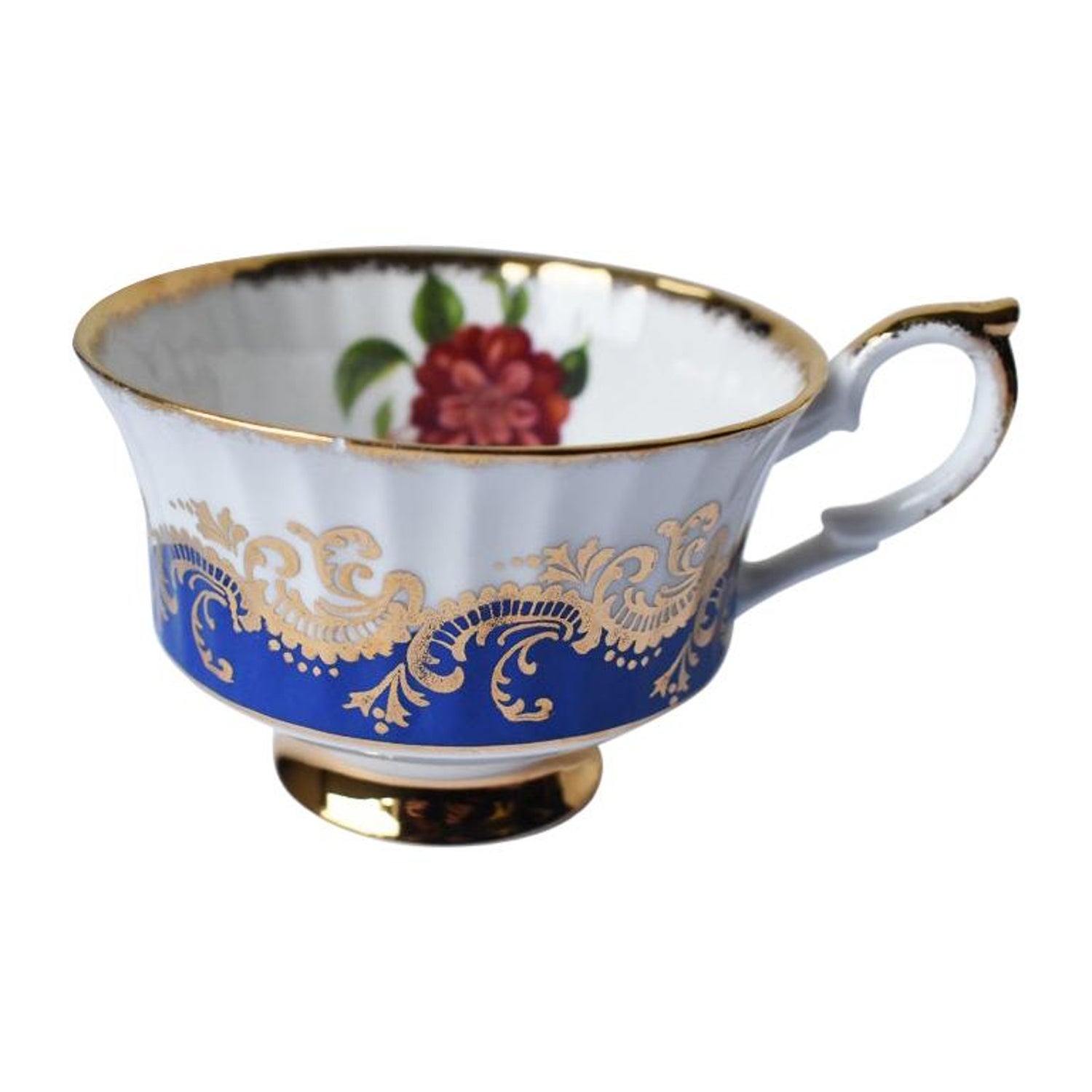 https://a.1stdibscdn.com/porcelain-paragon-tea-cup-with-gold-and-blue-and-hidden-rose-for-her-majesty-for-sale/1121189/f_157317311575015547284/15731731_master.jpg?width=1500