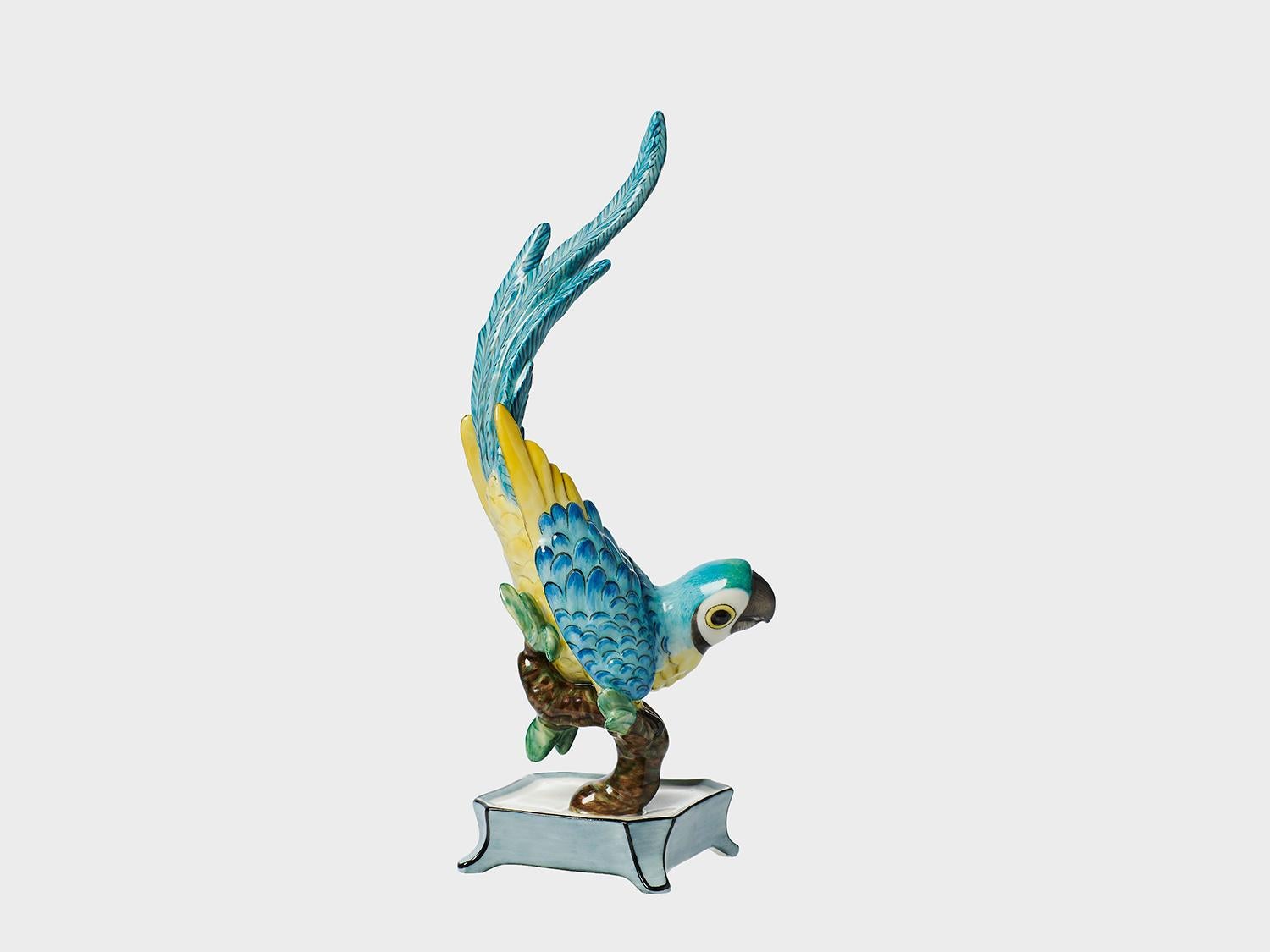 This handcrafted and hand painted parrot was designed by Luise Terletzki Scherf. She was a master of capturing the character of the animals and has created a menagerie of animals for Nymphenburg. They are hand cast and hand painted by the artisians