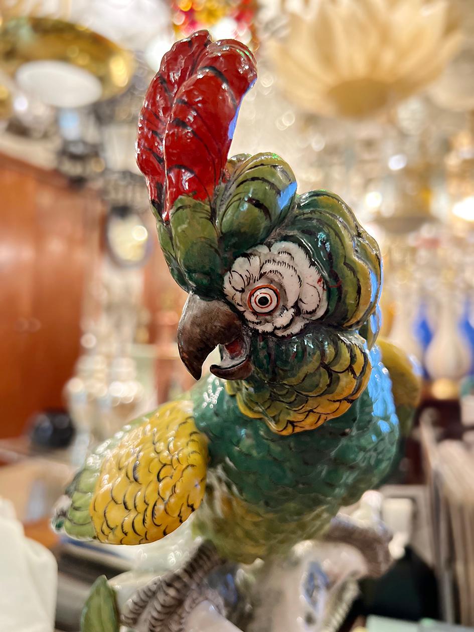 A circa 1920s German porcelain parrot figurine.

Measurements:
Height:11