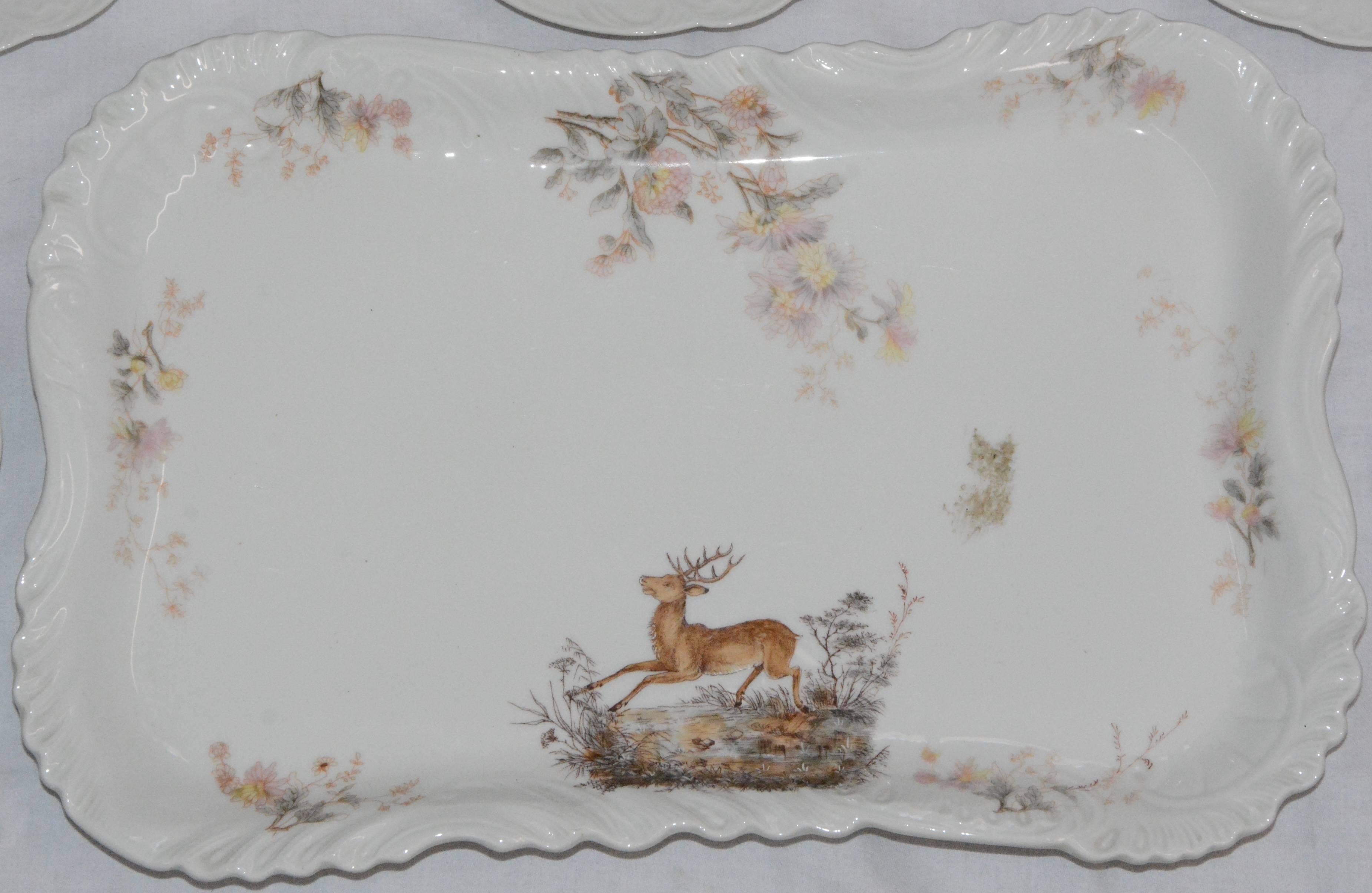 An array of frolicking animals is captured in the beauty of these plates and matching platter by Carlsbad of Austria. All the pieces of porcelain have a lovely embossed design. The plates measure 8.75 inches wide. The plates are marked but the