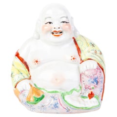 Groupe de Bouddha en porcelaine polychrome 