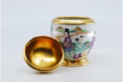 Porcelain pot w/ scenes from Japanese daily life w/ a gilded silver base & lid