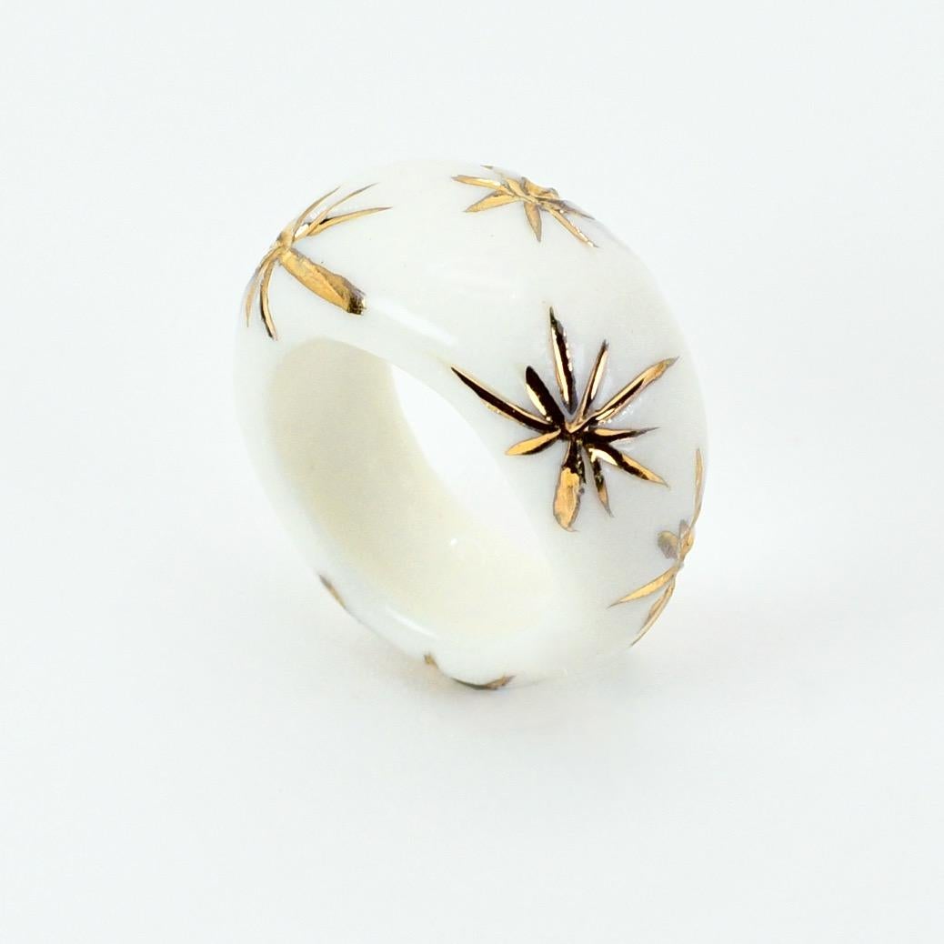 Porcelain  24K gold embellishment  Handmade in London

This porcelain ring is a stunning piece of art. Meticulously handcrafted from the whitest porcelain and embellished with 24K gold, it radiates uniqueness. It possesses pristine appearance that