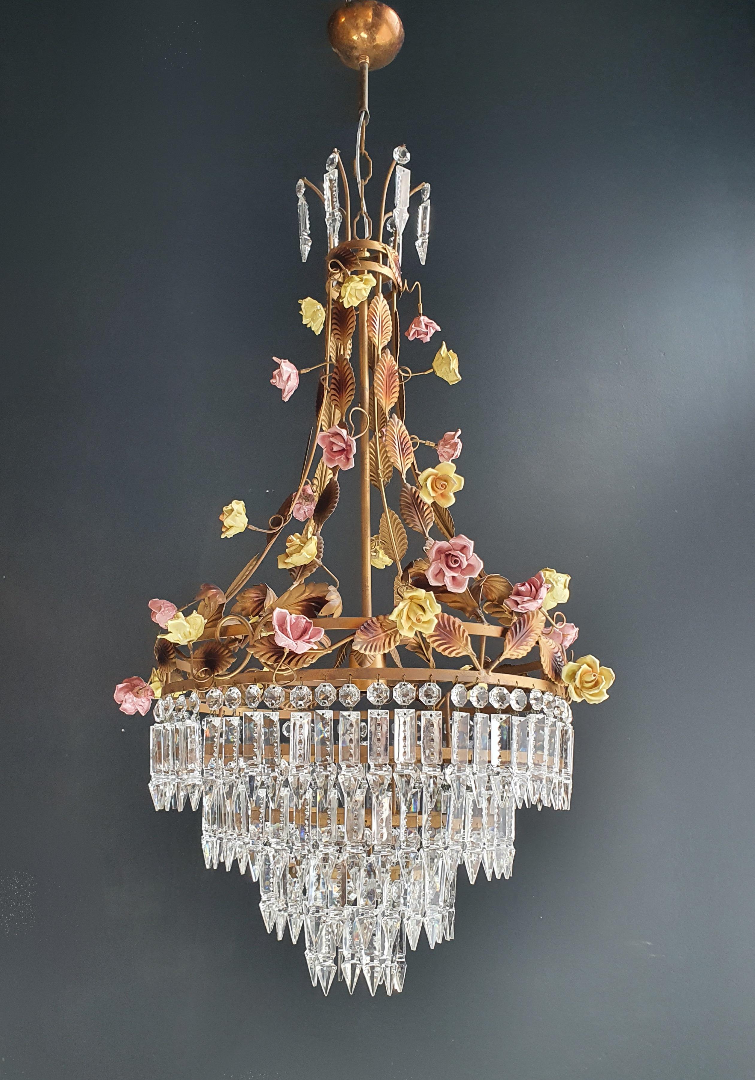 Handcrafted Porcelain Roses in an Array of Colors Adorn this Exquisite Piece

Indulge in the allure of our meticulously crafted chandelier, adorned with delicate porcelain roses in a variety of enchanting hues. Each porcelain rose has been