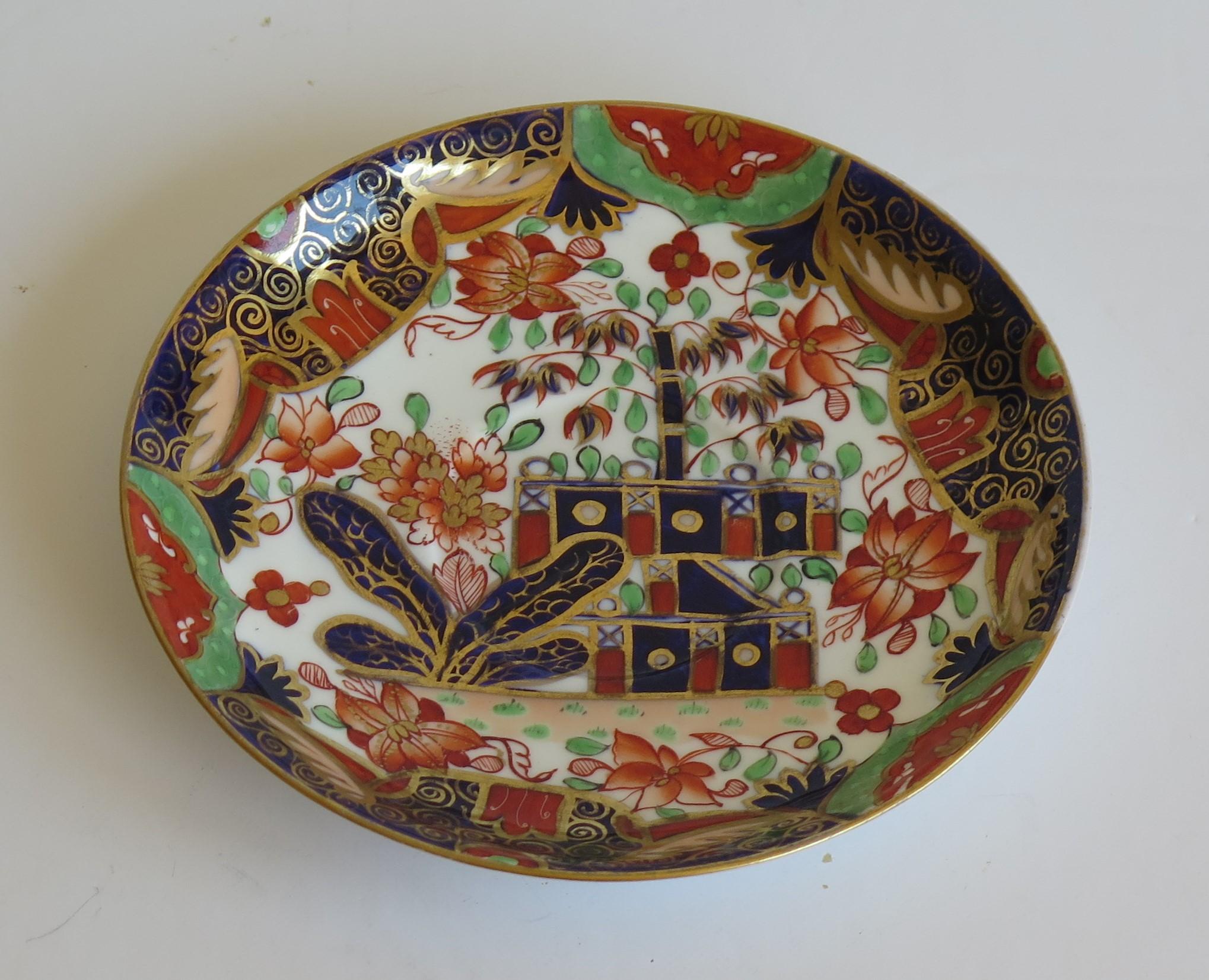 This is a beautiful small saucer-dish in the Japanese inspired Imari Fence pattern number 794, produced by the Copeland - Late Spode factory and made of porcelain in the mid 19th century, circa 1865.

The pattern is finely hand painted in bold