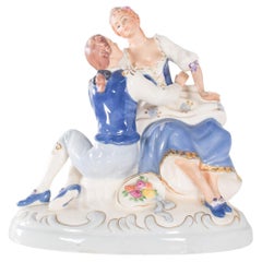 Scultura in porcellana Donna e Gentiluomo seduti