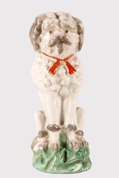 Porcelain sculpture of a Poodle dog, England 1900.