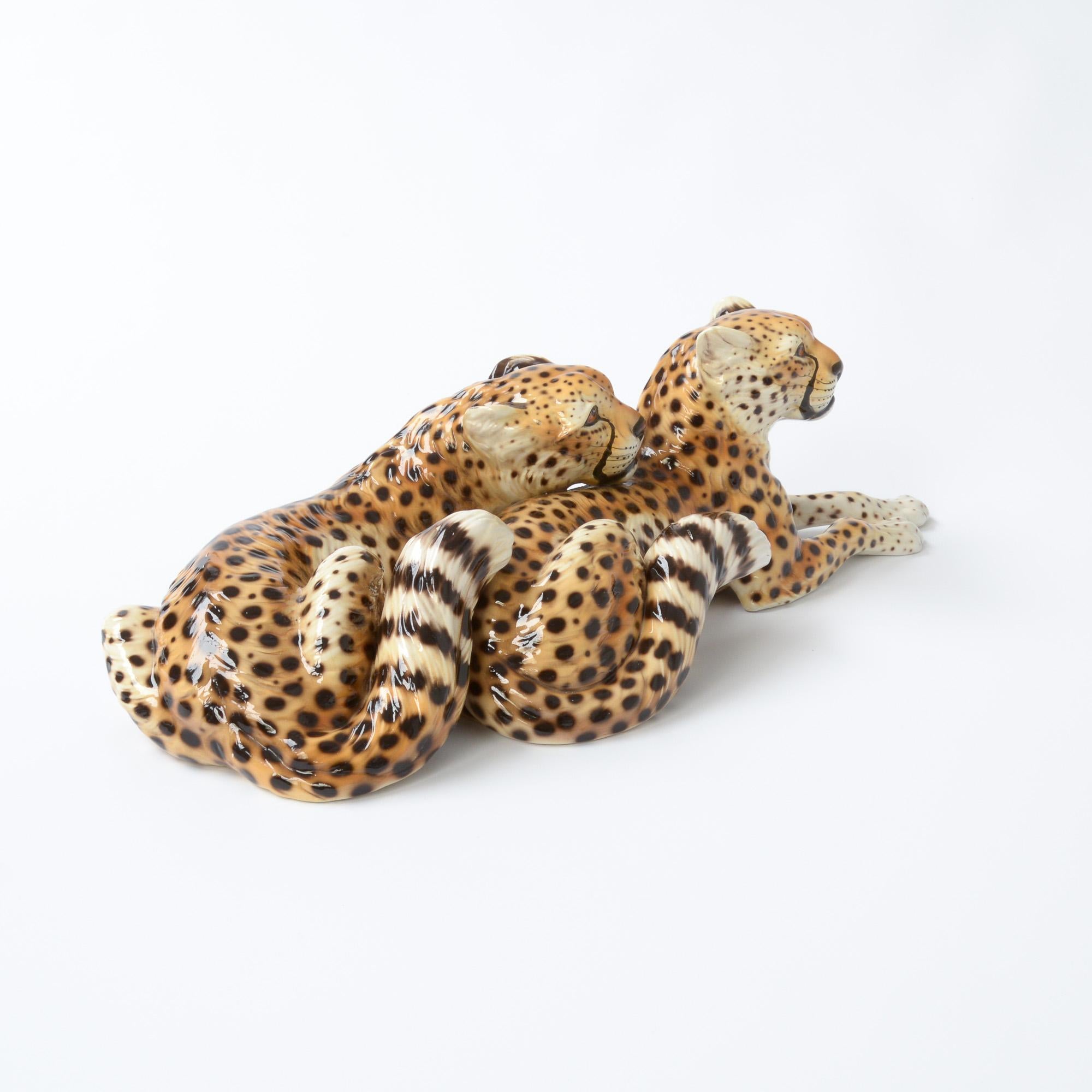 This porcelain sculpture of reclining cheetahs is made by the Italian artist Ronzan. It can be dated in the 1950s.
Giovanni Ronzan and his brother founded the Ronzan factory circa 1940s shortly after he had left his job as chief painter and ceramic