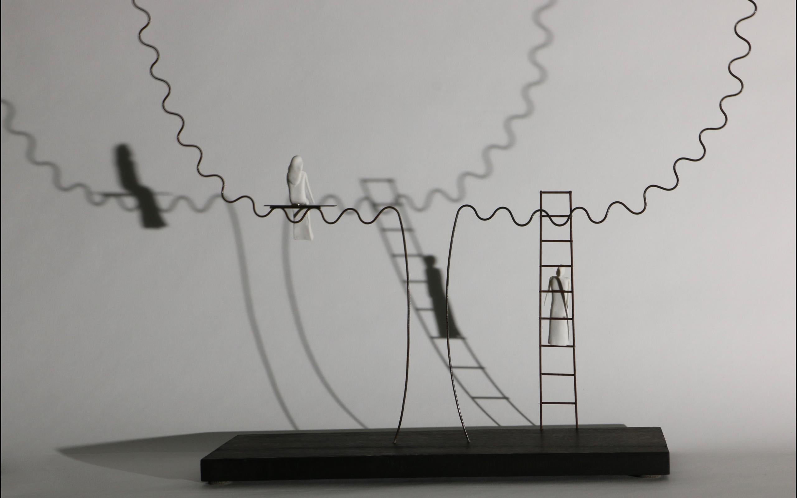 This sculpture and table lamp is called 