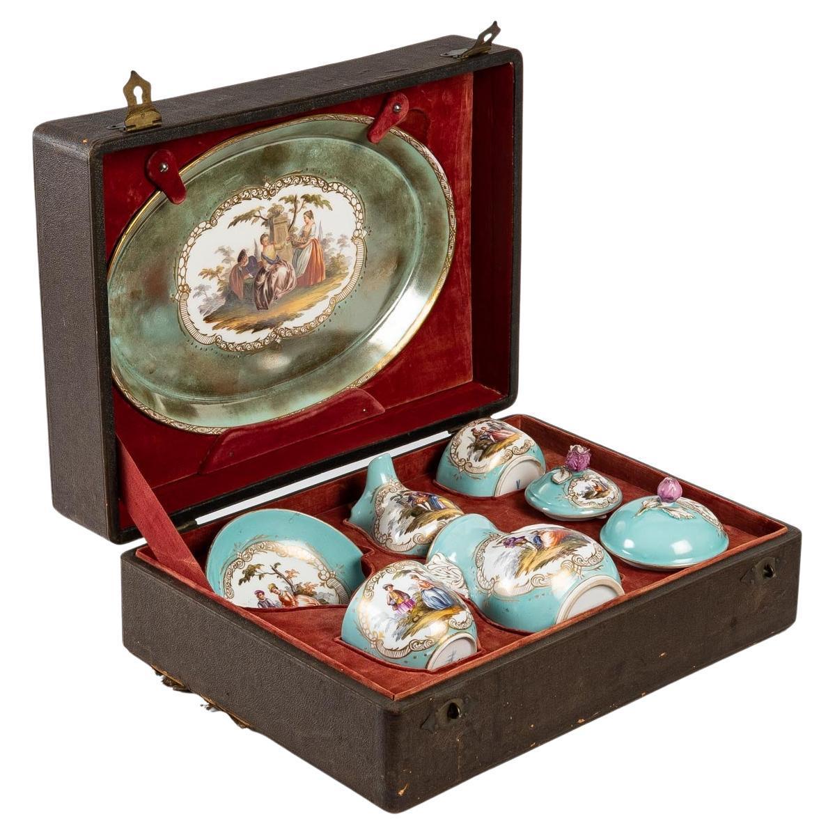Porcelain service and its Meissen tray, 19th century

Porcelain service and its Meissen tray in its box composed of a cup, sugar bowl, milk jug, teapot and tray, 19th century, Napoleon III period.

Box - H: 15 cm, W: 37 cm, D: 26 cm

 