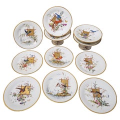 Porcelain service with birds against a gilt screen