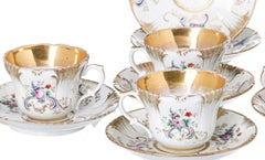 Porcelain - Set of four cups and six saucers