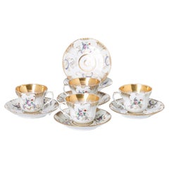 Porcelain - Set of four cups and six saucers