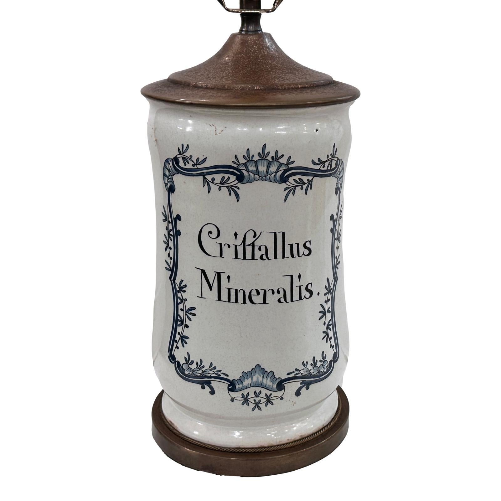 A circa 1900 Italian porcelain apothecary jar mounted as a lamp.

Measurements:
Height of body: 12