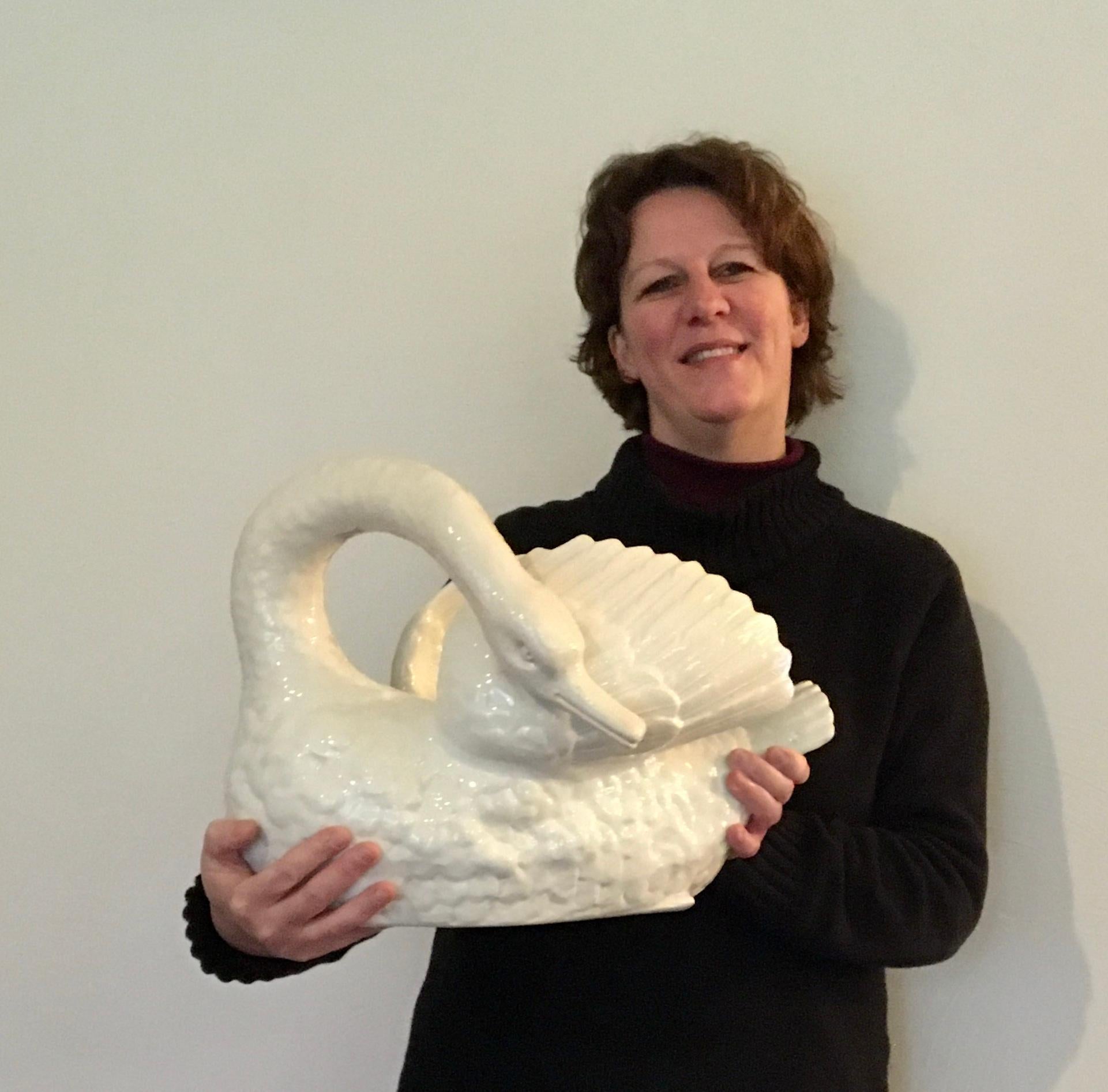 Porcelain Swan planter by Mouzin - Lecat et Cie. 
Antique white planter made by Mouzin-Lecat & Cie , 
Faiencerie de Nimy Belgium. 
A white swan sculpture - white swan planter ,
stamped Mouzin - Lecat et Cie. 
According the stamp, this swan dates