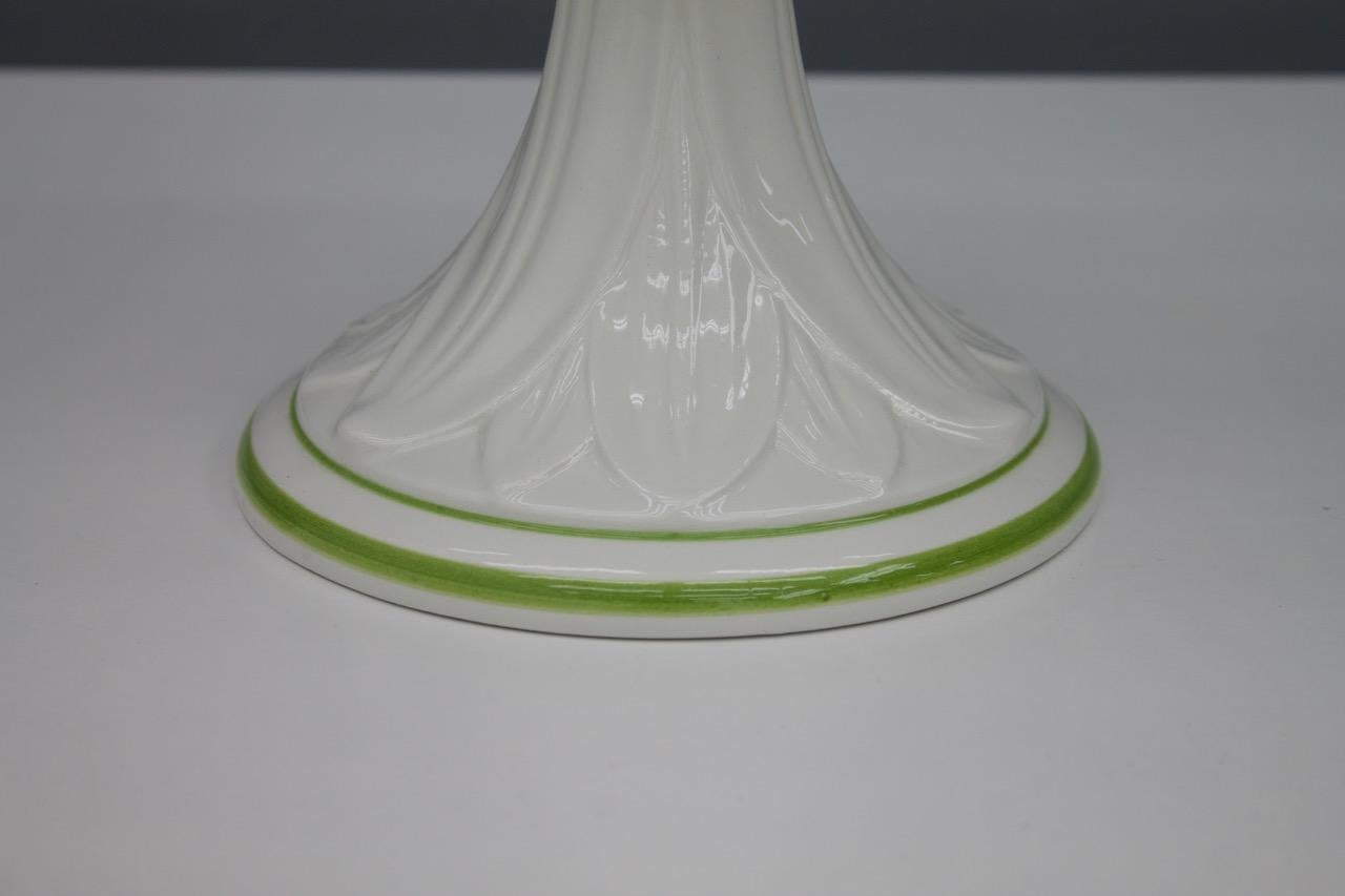Nice small porcelain table lamp by Bassano, Italy. This table lamps comes from the 1960s.
Very good condition.