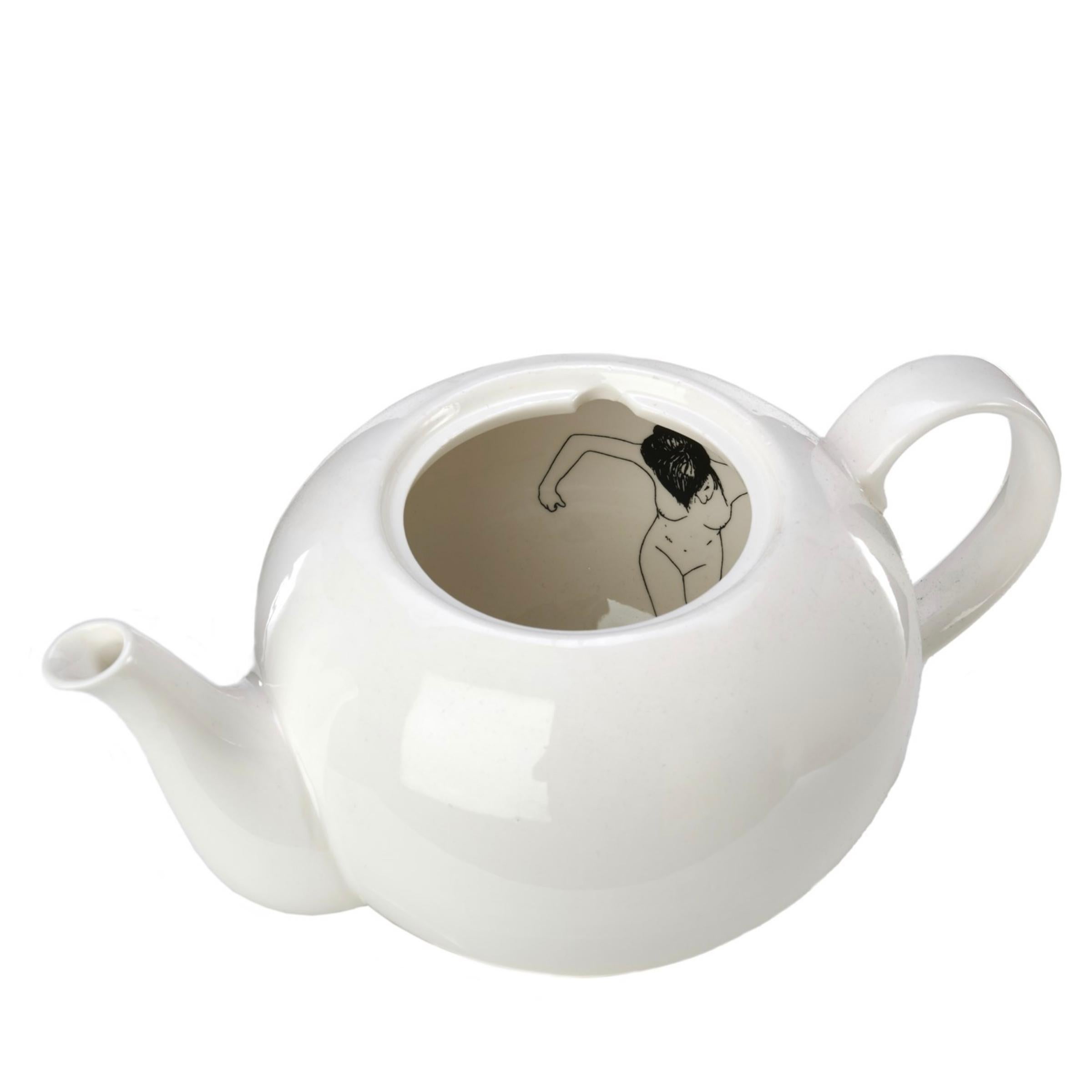 A porcelain tea pot featuring line drawings of an undressed woman. Upon opening the lid she is discovered to be bathing in the pot. Designed by Esther Hörchner in the Netherlands. 

Measurements: 8”H x 7”W