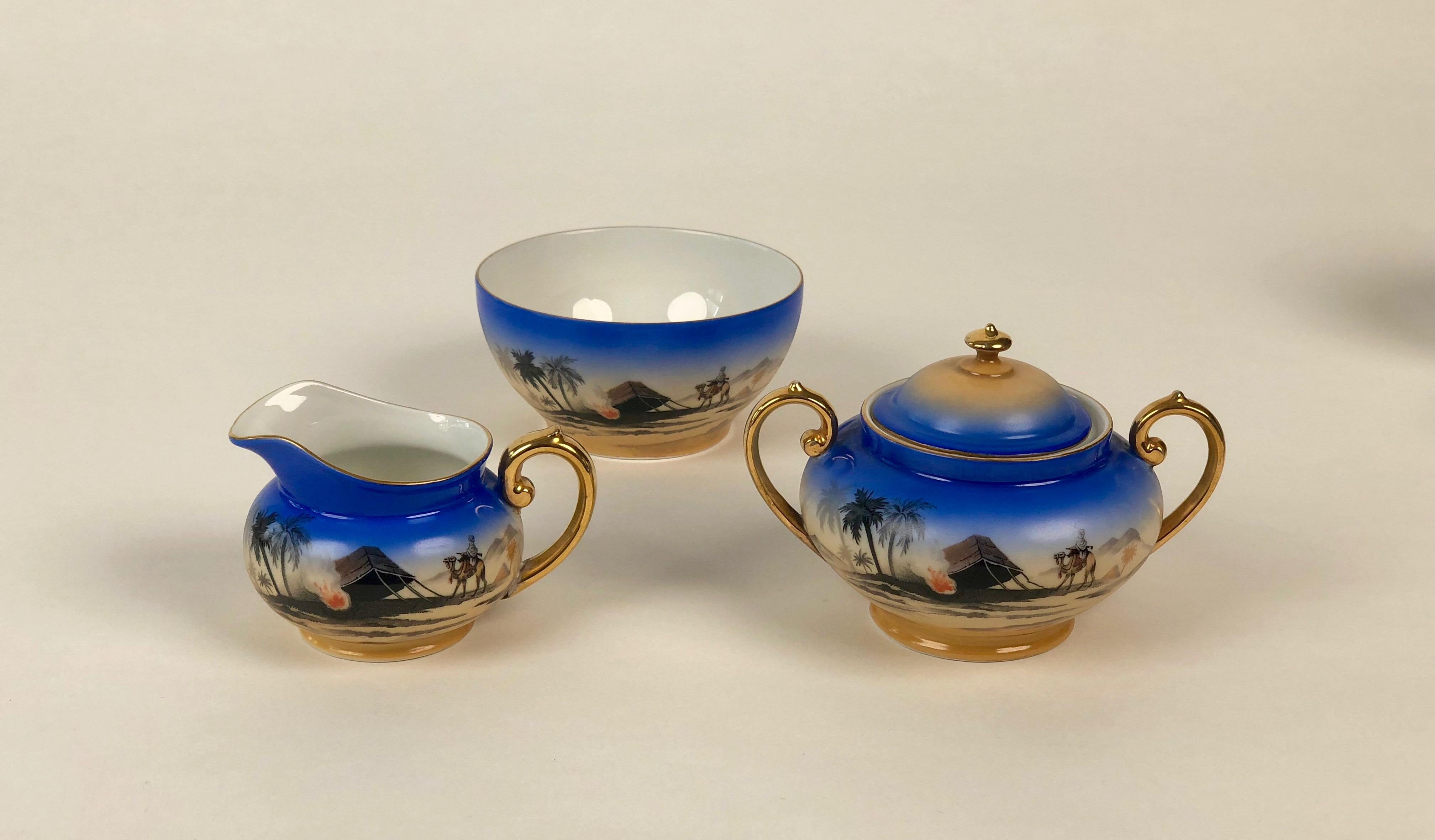 Porcelain tea set, model Sahara from the porcelain manufactory Epiag Royal, Czechoslovakia.
Company Epiag, later included in the Carlsbad manufactory, is famous for its fine quality bone China.
Decorated with riding beduin on a camel in the