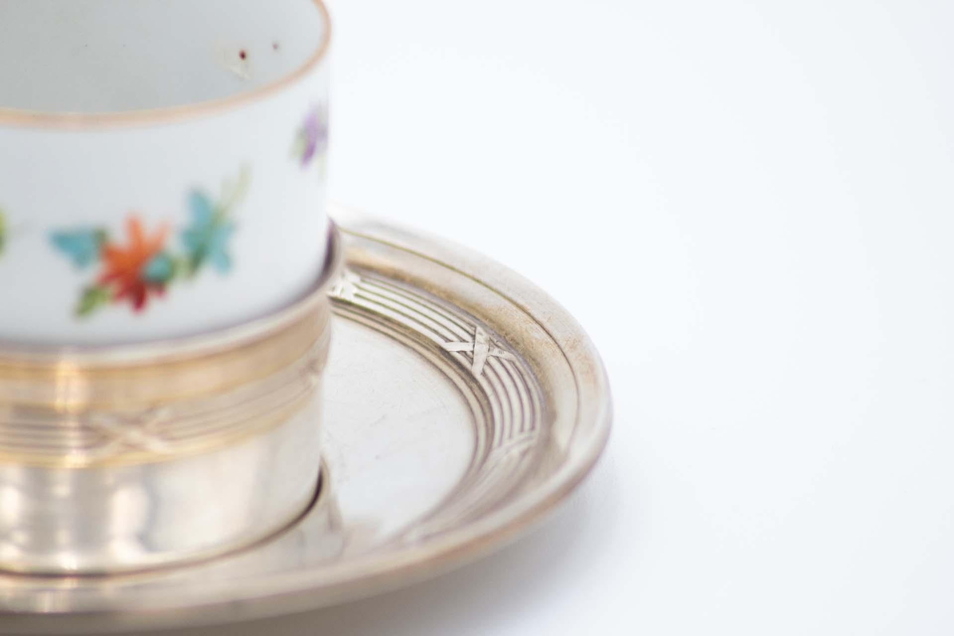 European Porcelain teacup with silver saucer For Sale