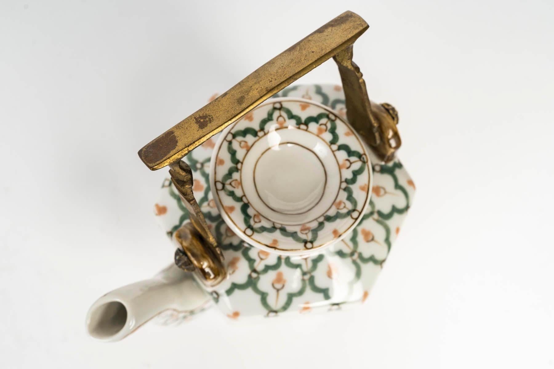 Asian Porcelain Teapot, Bronze Handle, 20th Century. For Sale