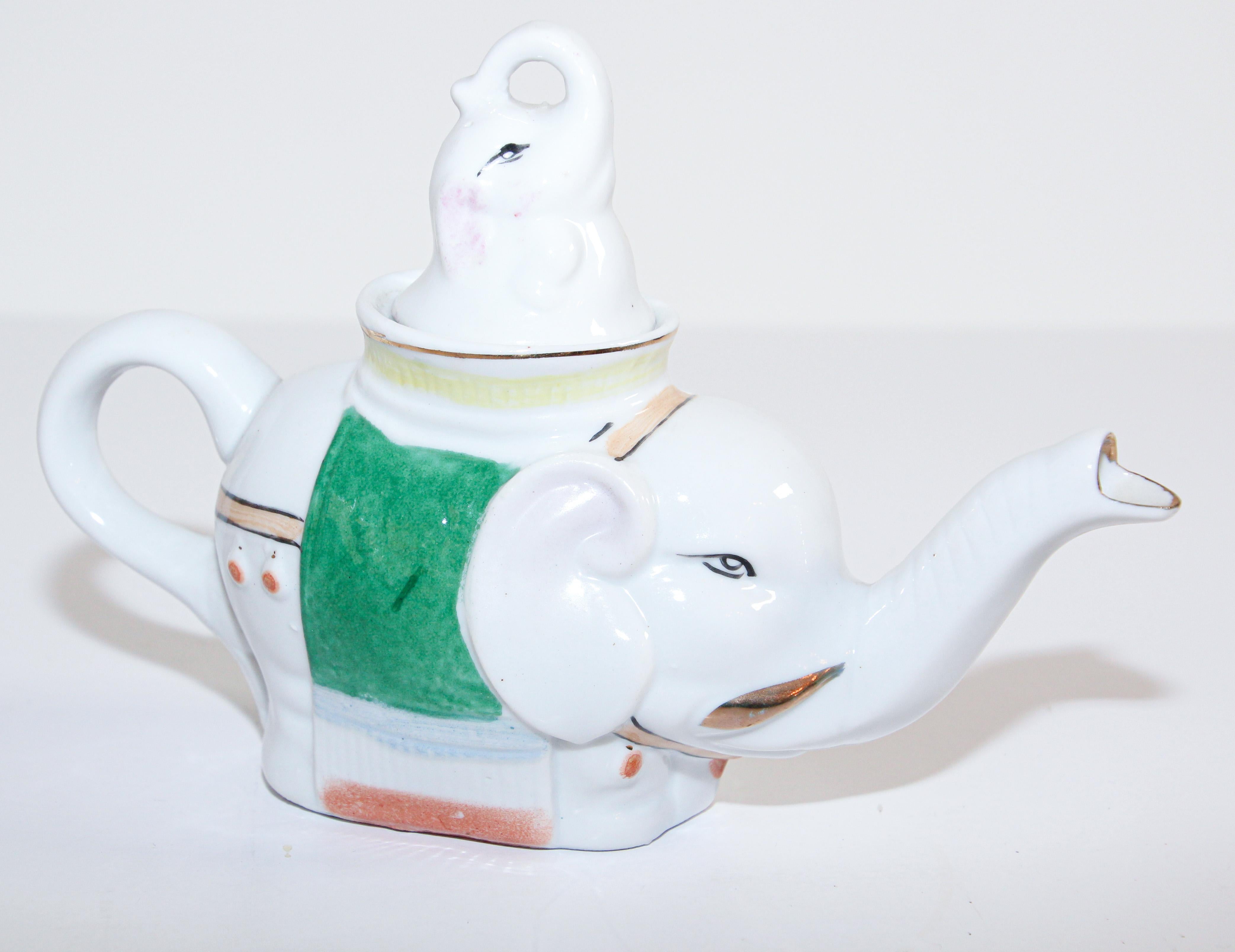 antique elephant teapot