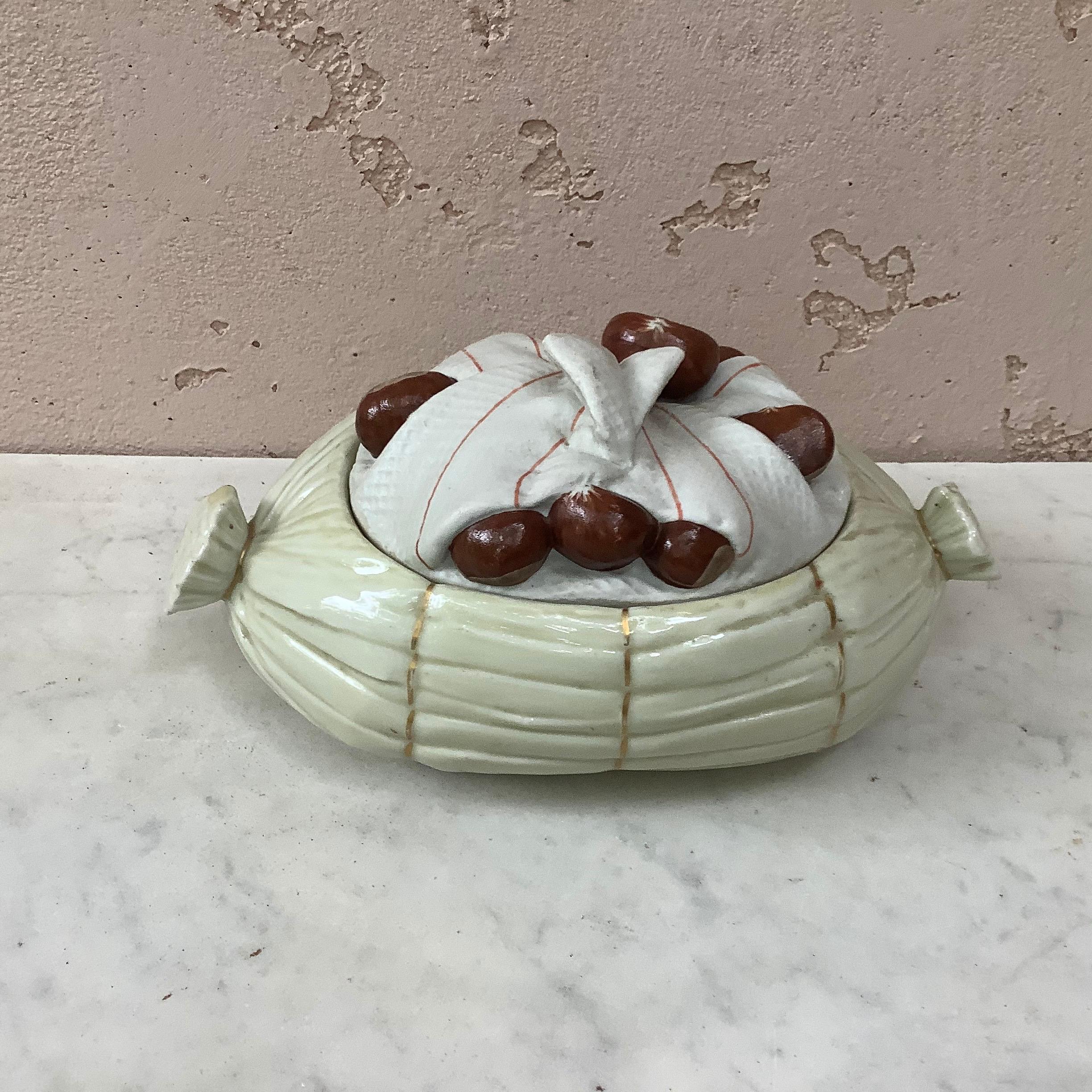 Porcelain trompe L'oeil Chestnut tureen signed Mehun, circa 1930.