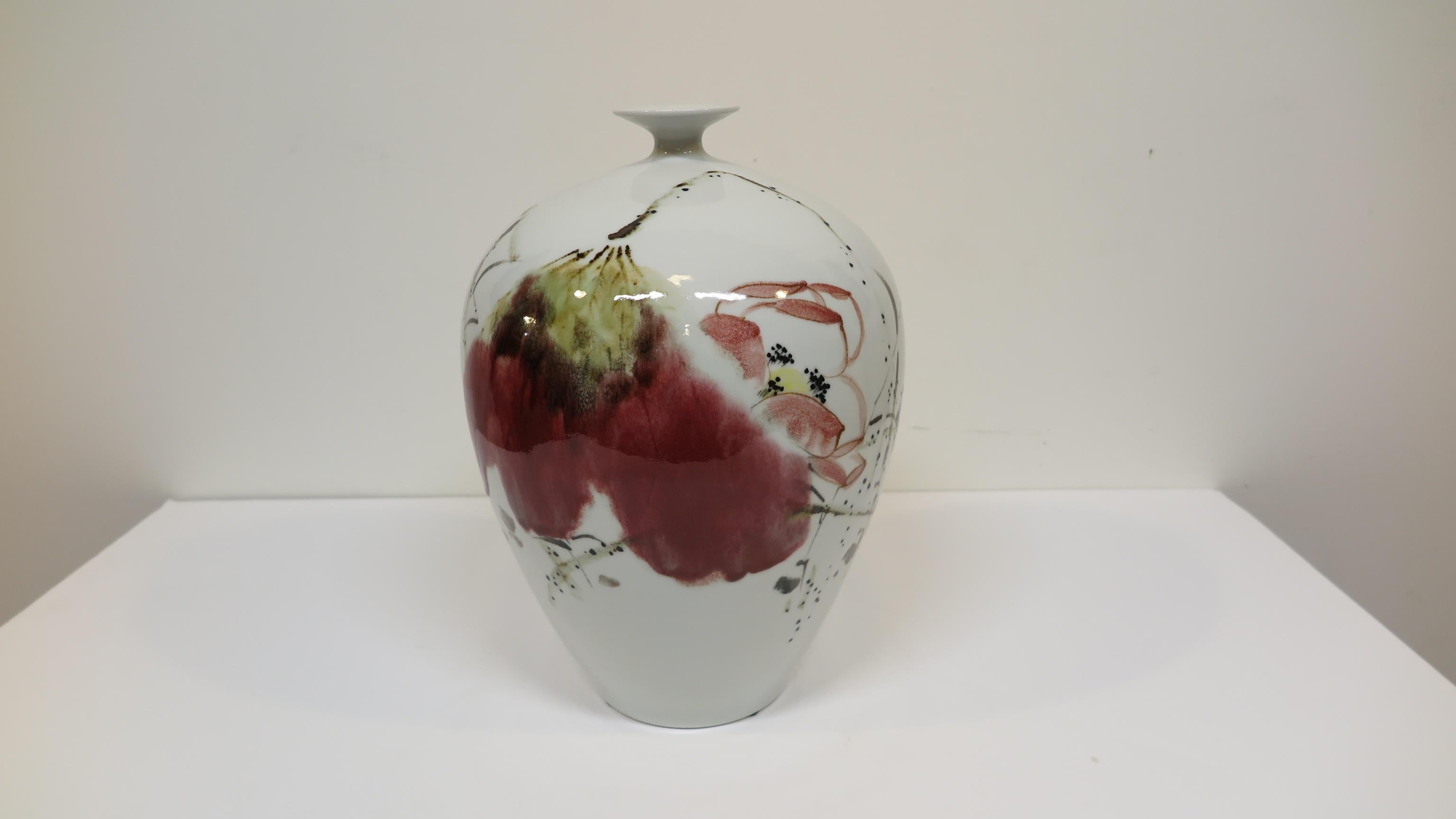 Chinese fine porcelain artisan vase. Beautifully hand formed and painted each signed by the artist with a poem.
 