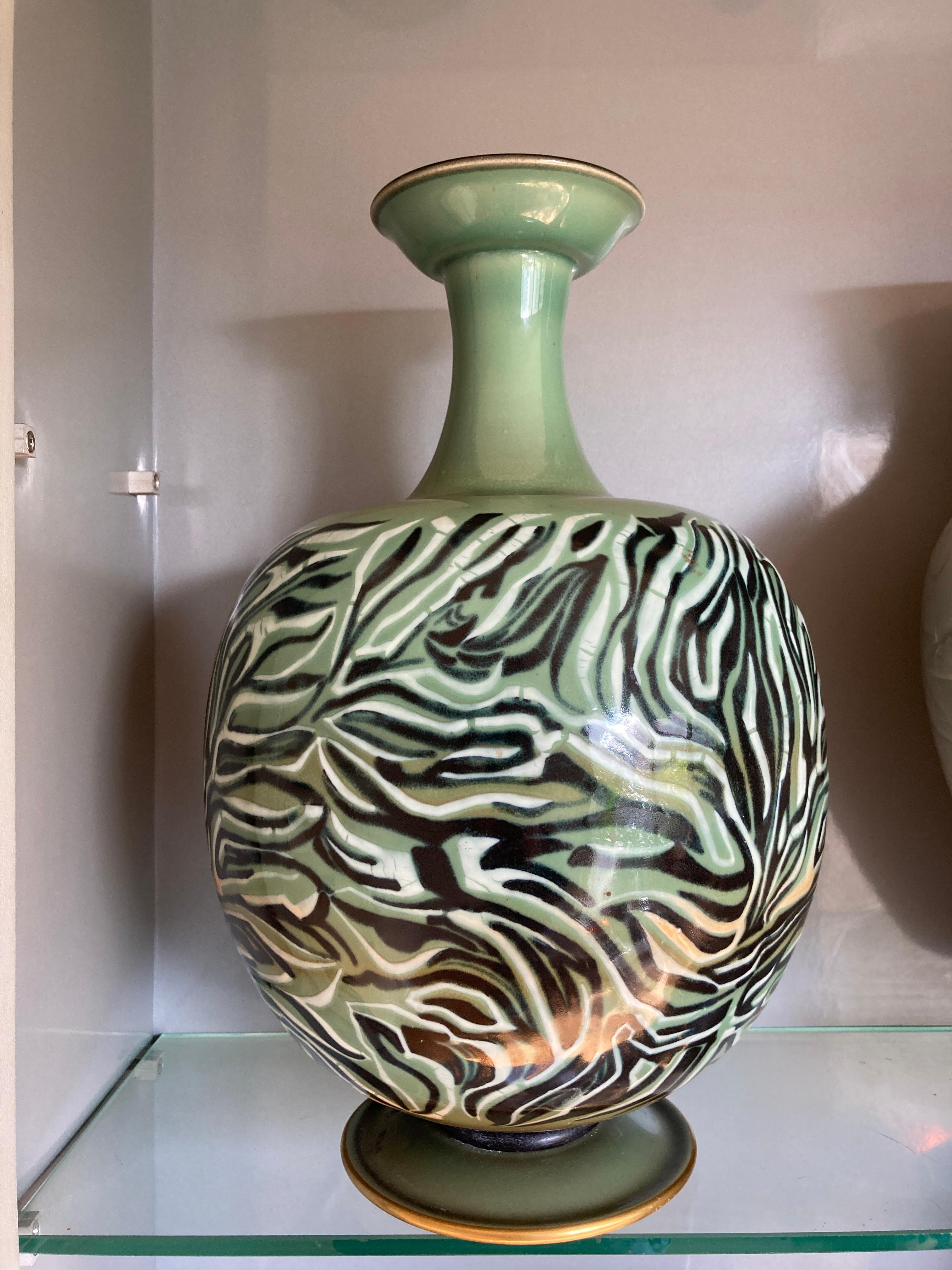 Very beautiful porcelain vase by Manufacture Nationale de Sèvres
Most famous porcelain factory in the world.
Vase signed by Andre Plantard
Dated 1963 
This is a rare piece located in museums and documented in books