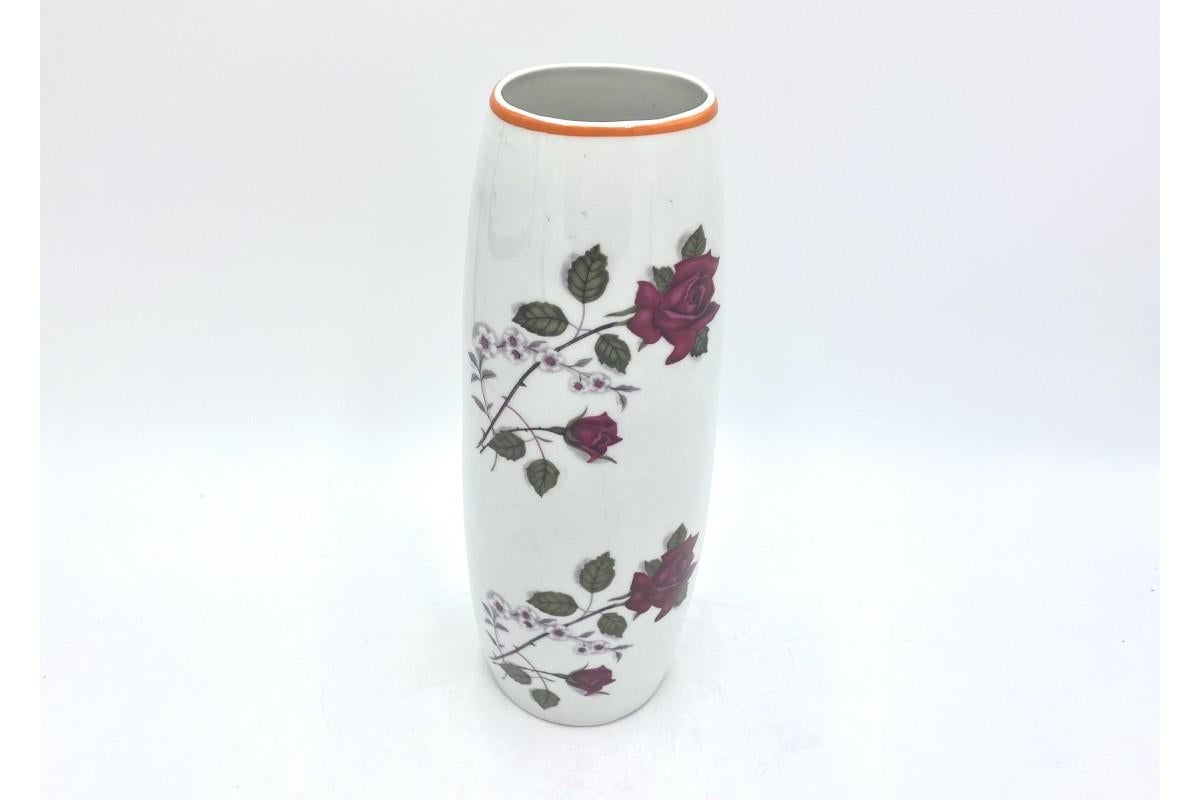 Ceramic vase with a rose pattern. Very good condition.

Produced by the Krzysztof Porcelain Factory (formerly Wawel)

Measures: height 32cm, width 10cm, depth 7.5cm.
