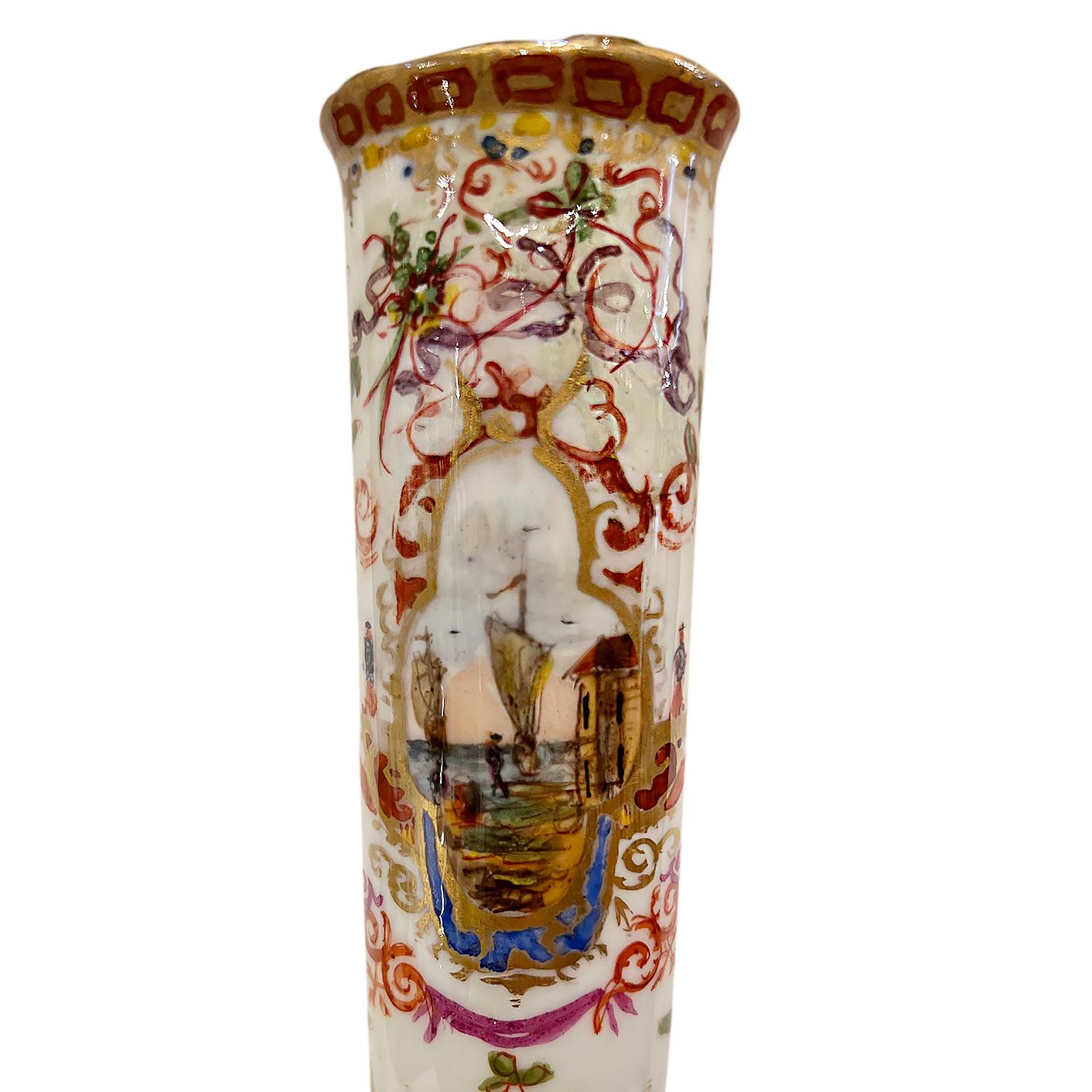 A circa 1930's English porcelain vase with painted landscape on body and gilt details.

Measurements:
Height: 12