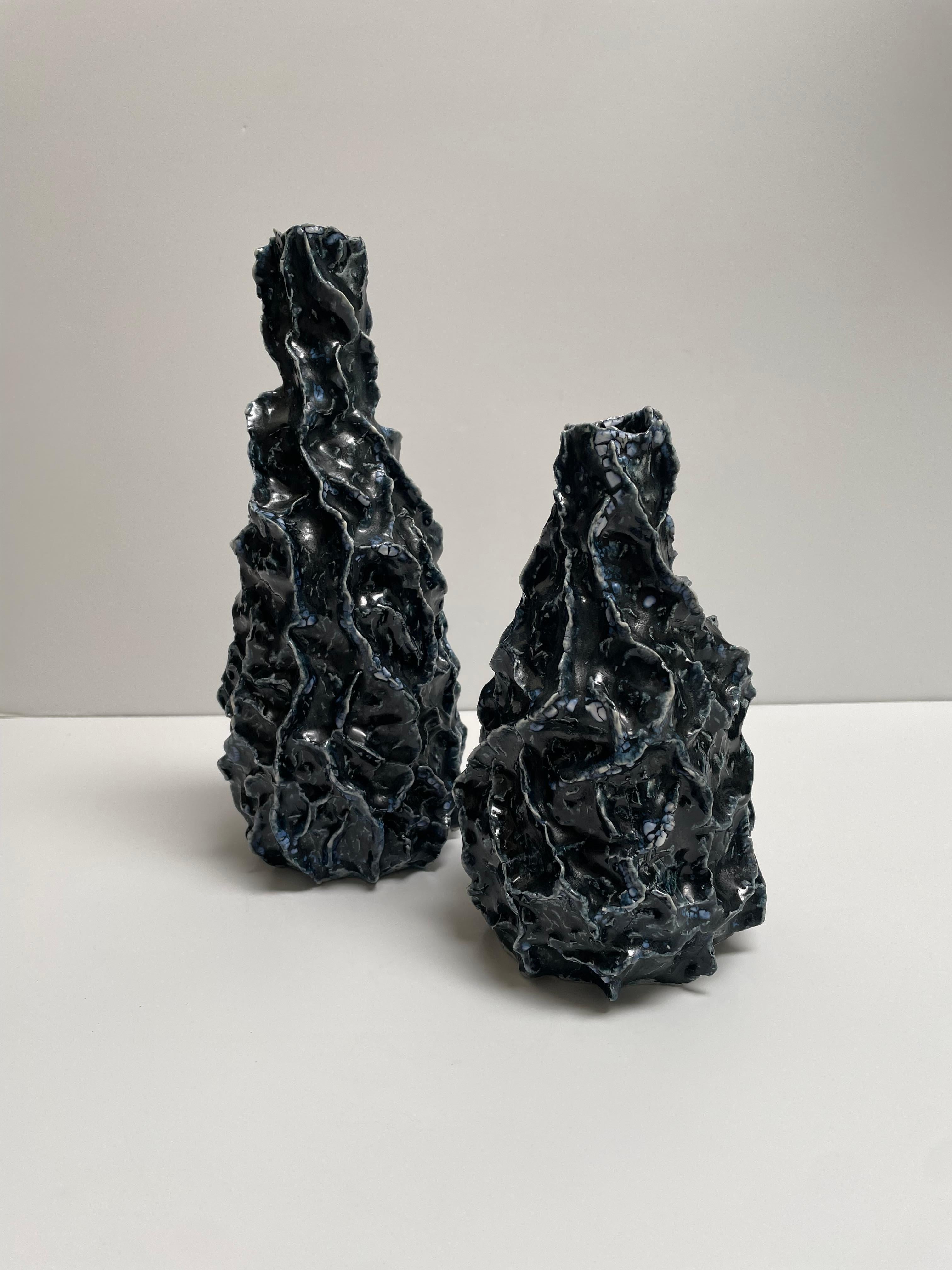 Ceramic Porcelain Vessel/Vase Sculptures:
Porcelain ceramic vessels, these ceramic art pieces have morphed from a two-year style that is evolving into a new style I am working and focusing on now. These pieces are created from clay coils, then