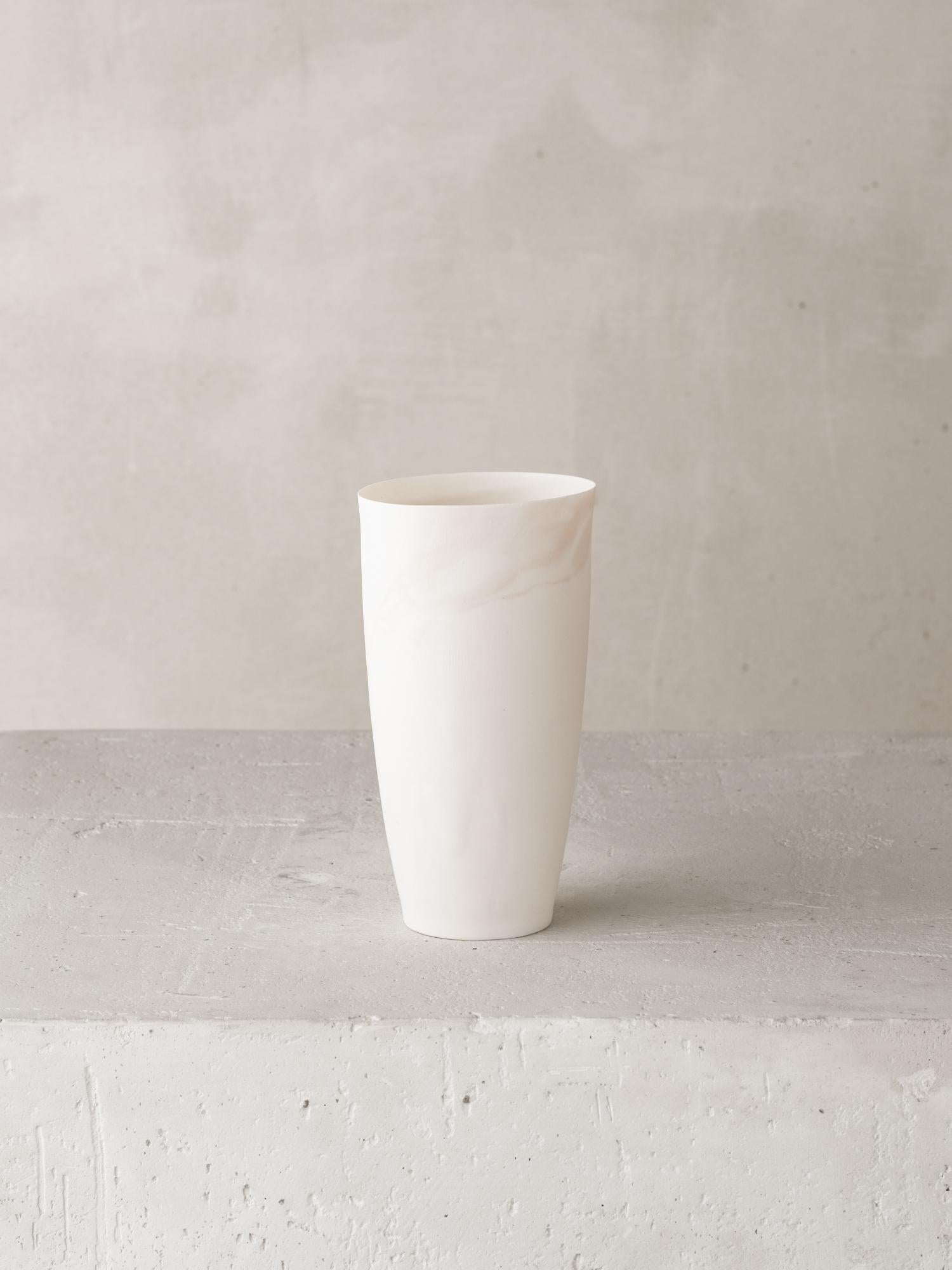 Materials: Cast Porcelain with Colored Oxide 

For over forty years Katherine Glenday has been creating meditative ceramic and porcelain pieces by hand in her South African studio. Remarkable in their translucency and luminosity, the porcelain