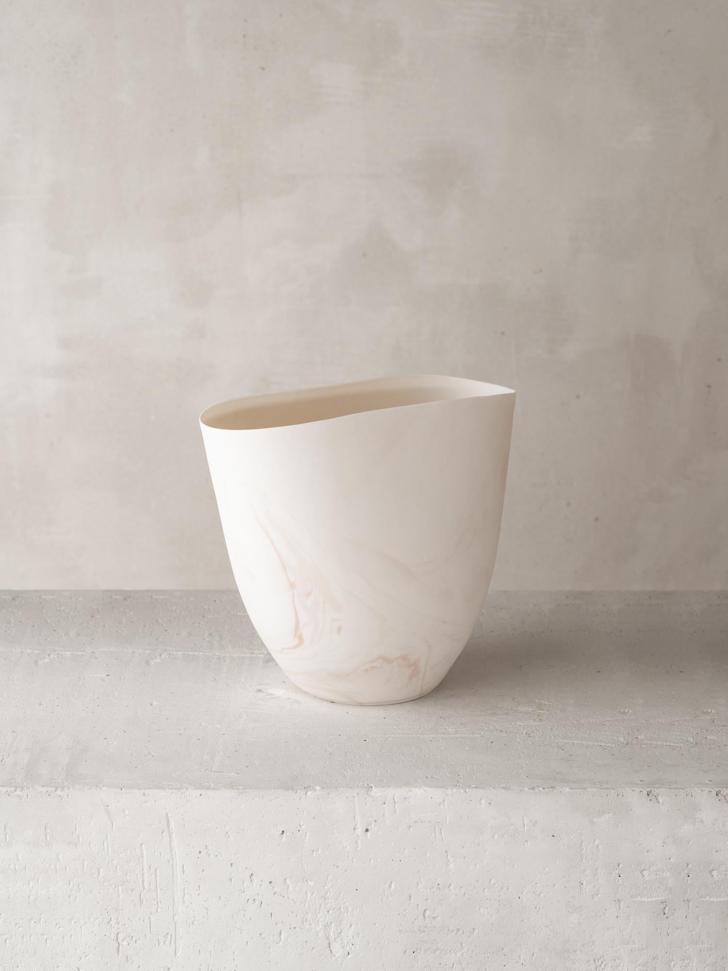 Materials: Cast Porcelain with Colored Oxide 

For over forty years Katherine Glenday has been creating meditative ceramic and porcelain pieces by hand in her South African studio. Remarkable in their translucency and luminosity, the porcelain