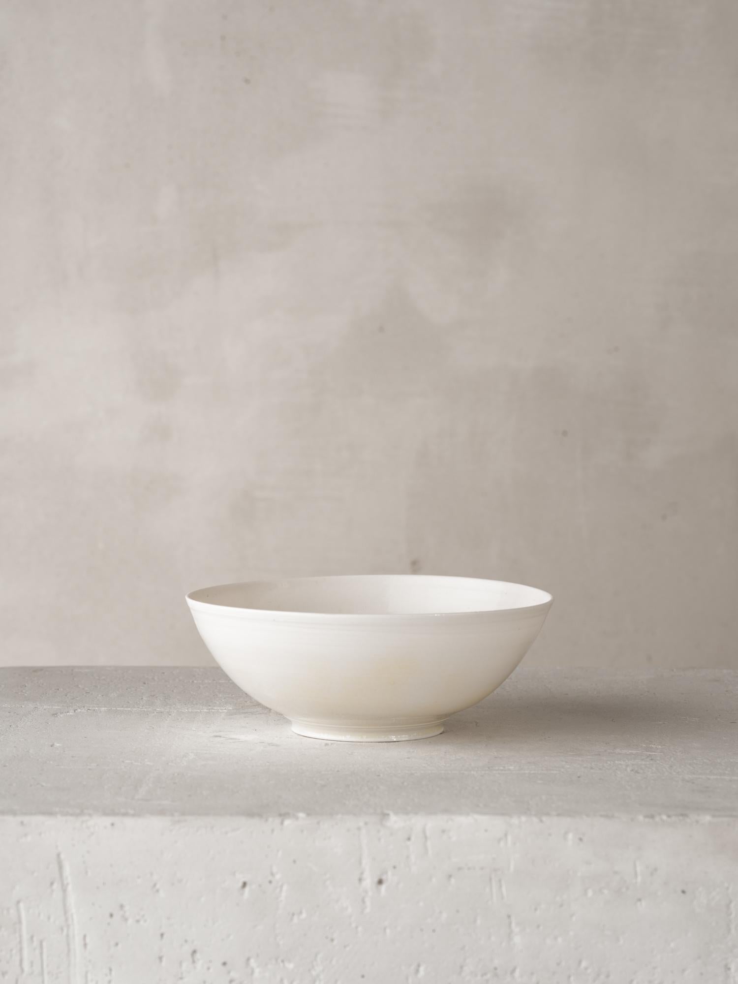 Materials: Wheel Thrown Porcelain
Unique Work  Signed by the Artist

For over forty years Katherine Glenday has been creating meditative ceramic and porcelain pieces by hand in her South African studio. Remarkable in their translucency and