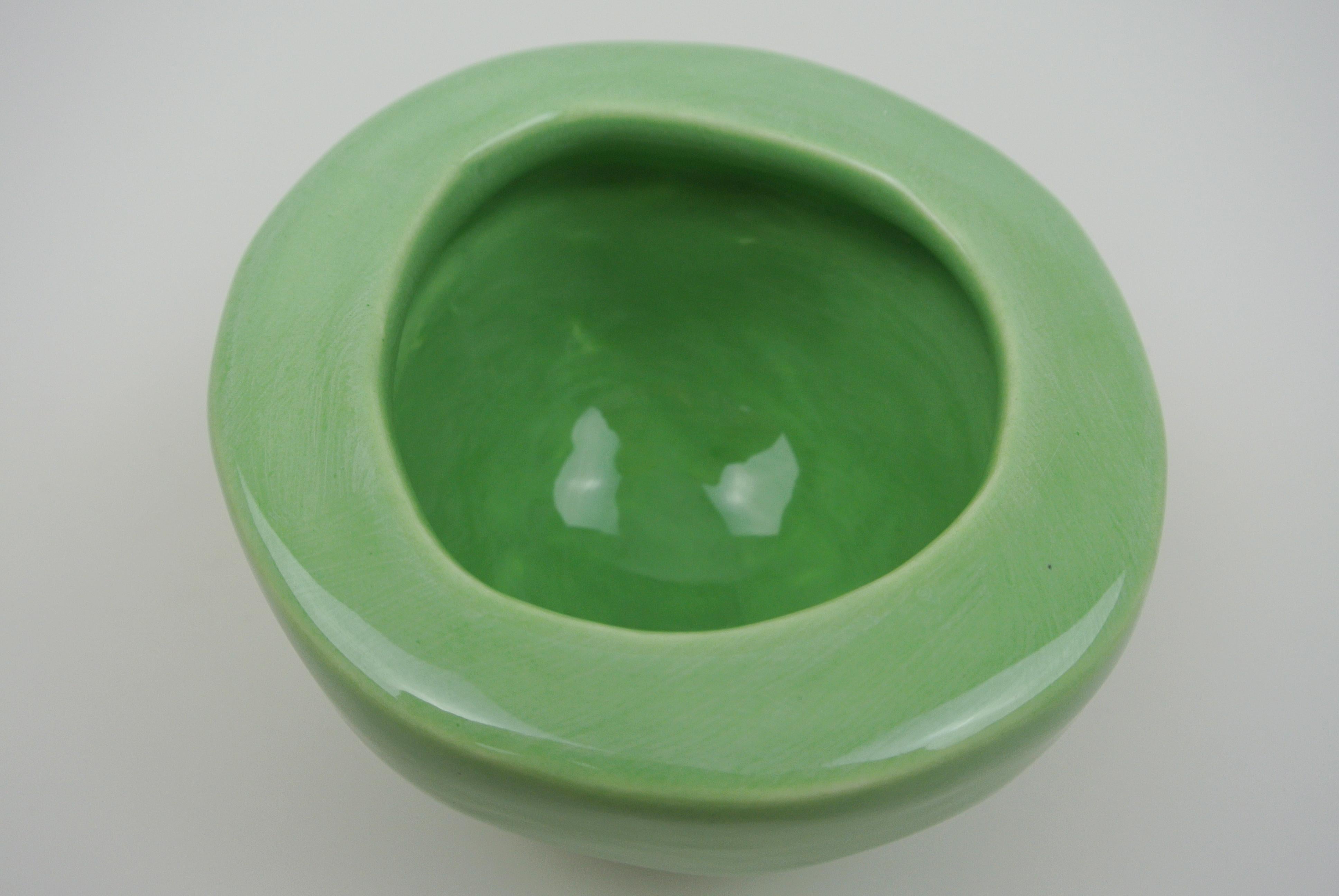 Carved Porcelain Vessel with Green Glossy Glaze For Sale