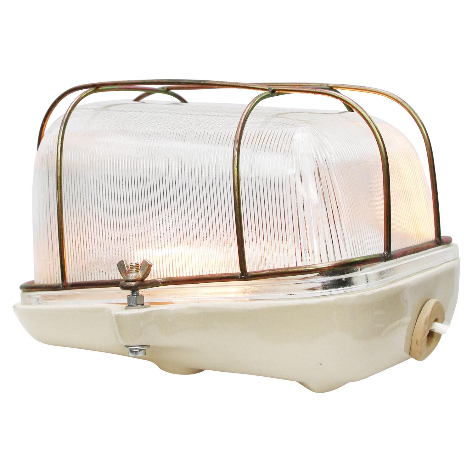 Industrial scone wall lamp, ceiling lamp, flush mount
Porcelain with striped clear glass

Not for use in the rain.

Weight: 2.00 kg / 4.4 lb

Priced per individual item. All lamps have been made suitable by international standards for