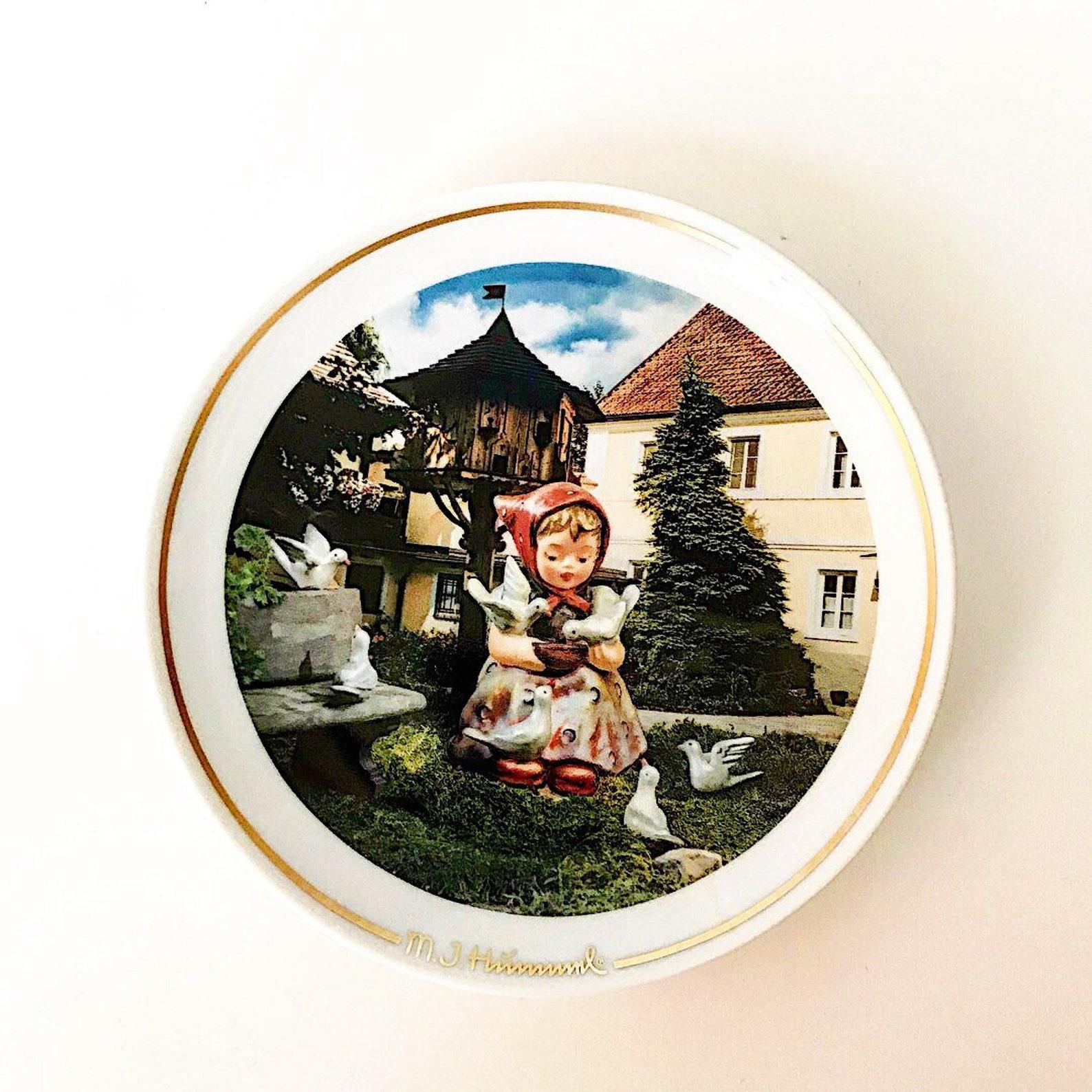 Vintage collection decorative porcelain plates from the famous German company Goebel. 

The anniversary series
 