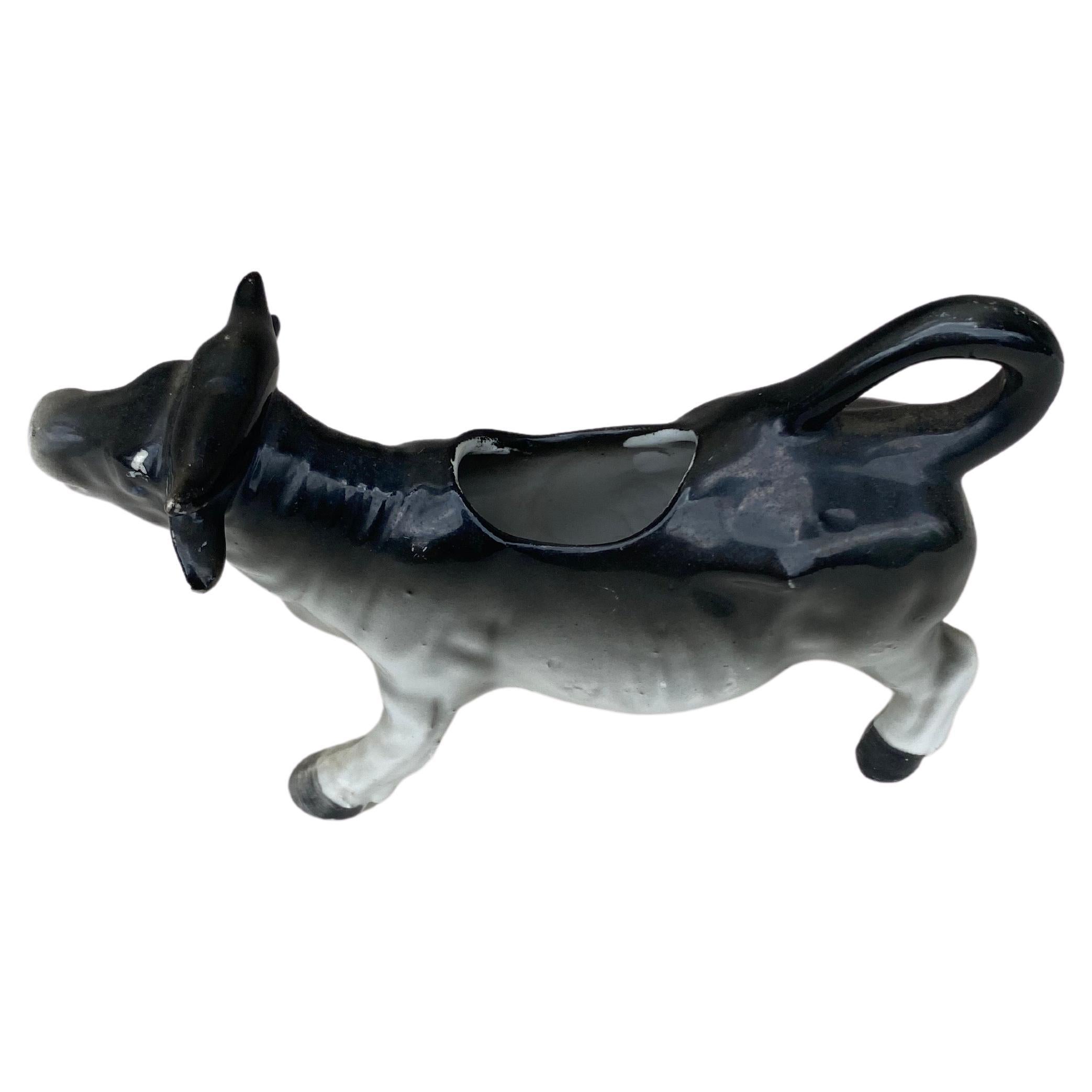 black and white cow creamer