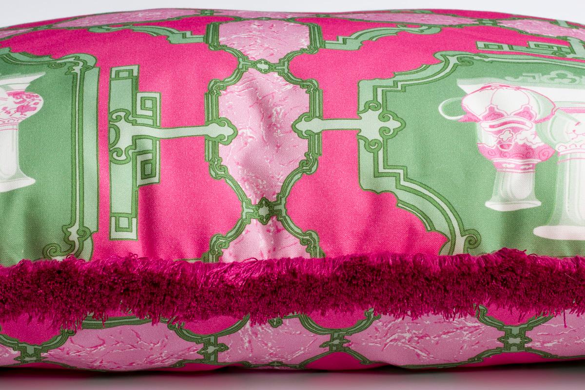 Porcelenas multicolored bright pink and green vase cotton fabric cushion/pillow: This shocking pink and bright green vase print fabric is inspired by signature documents from the archive. Finished off with a luxurious fringe. This cushion will bring