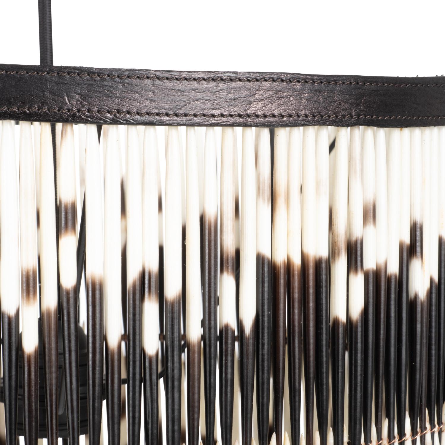 Porcupine Quill Pendants are made by hand in Cape Town, South Africa. All three style options are crafted from genuine porcupine quill, resulting in a unique and eye-catching style. Due to the use of natural materials, each piece is unique and may